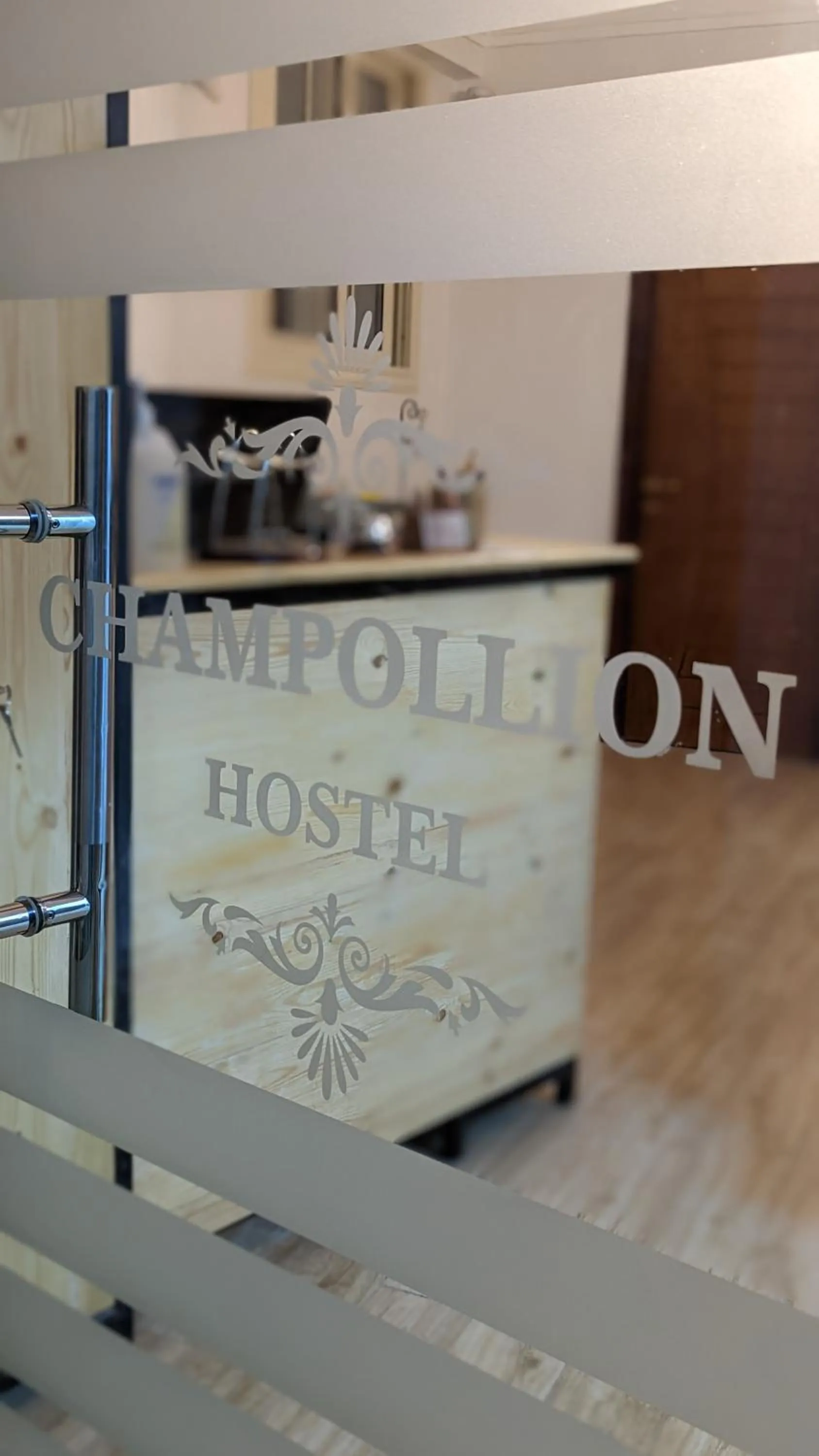 Property logo or sign in Champollion Hostel