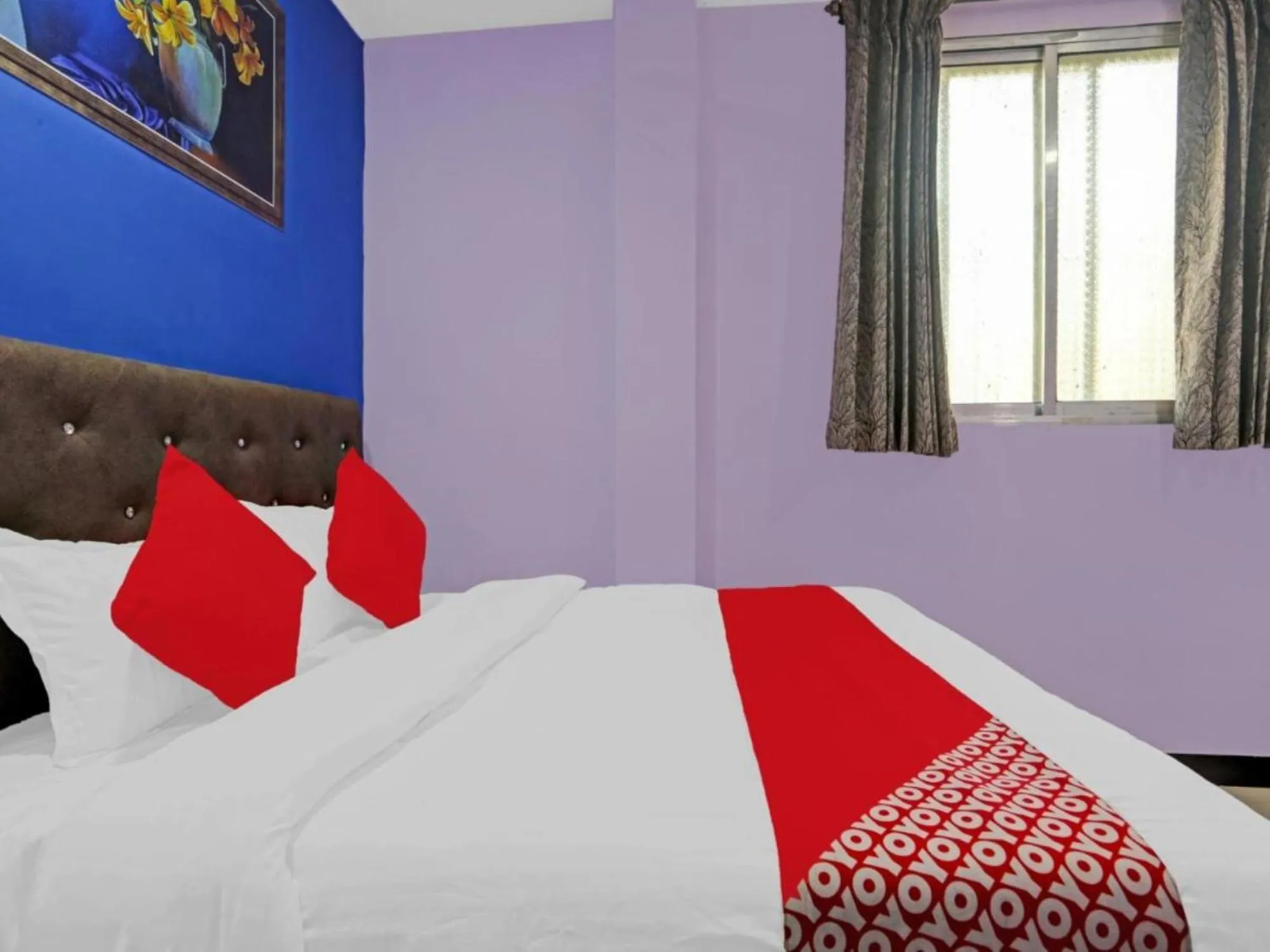 Bed in Hotel Welcome Inn,Mumbai