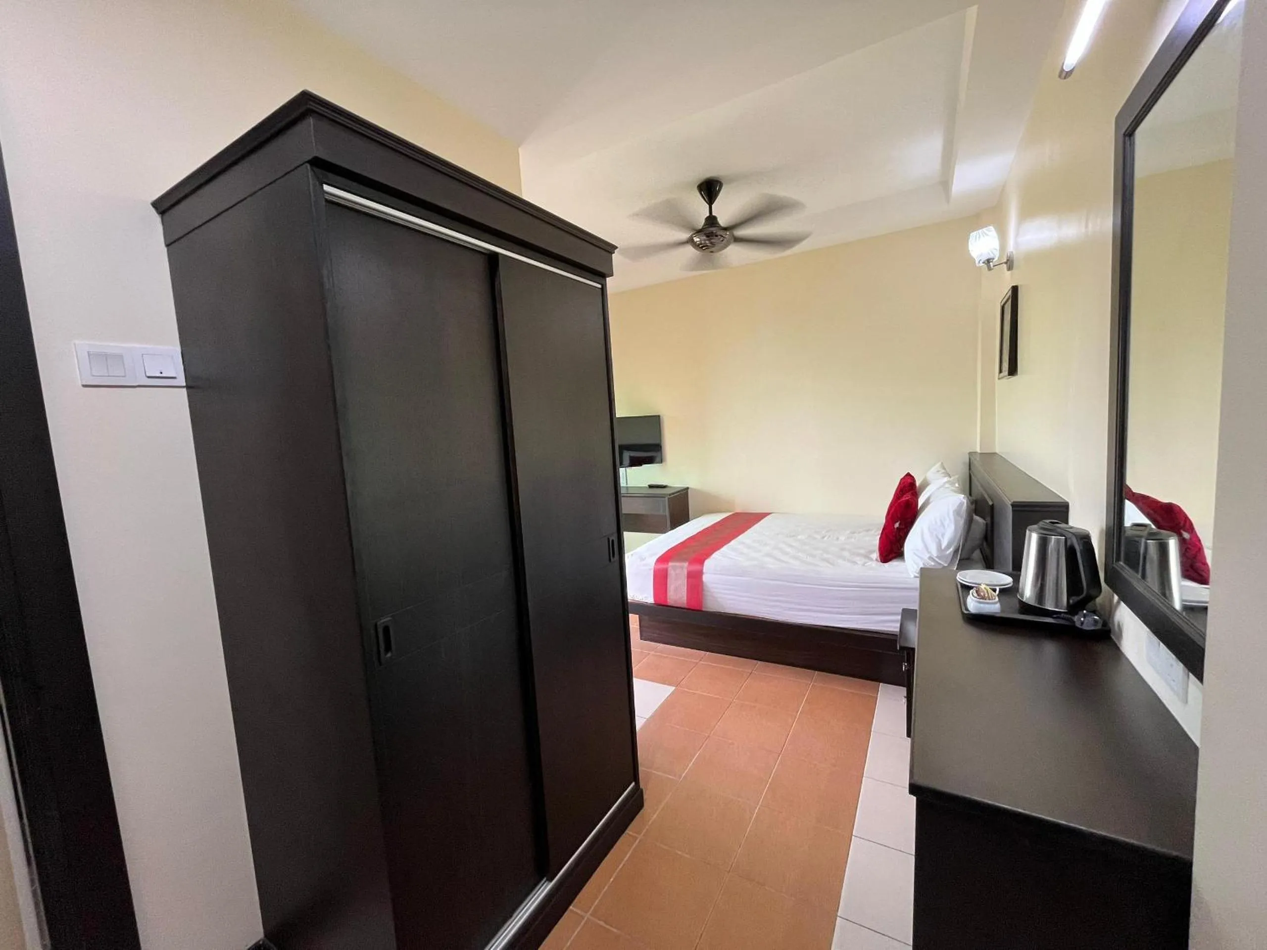 Bed in Sera Sentosa Inn