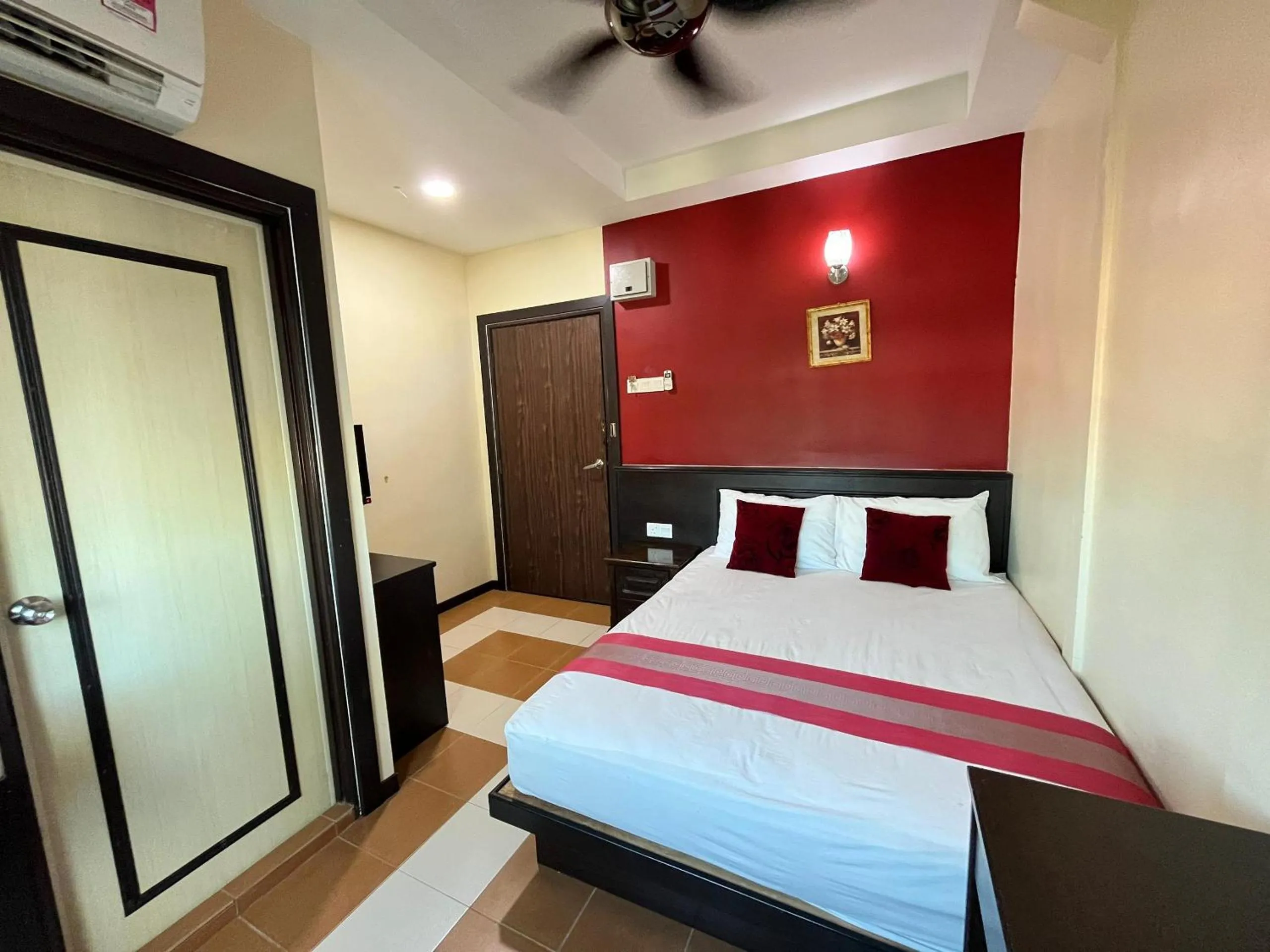 Bed in Sera Sentosa Inn