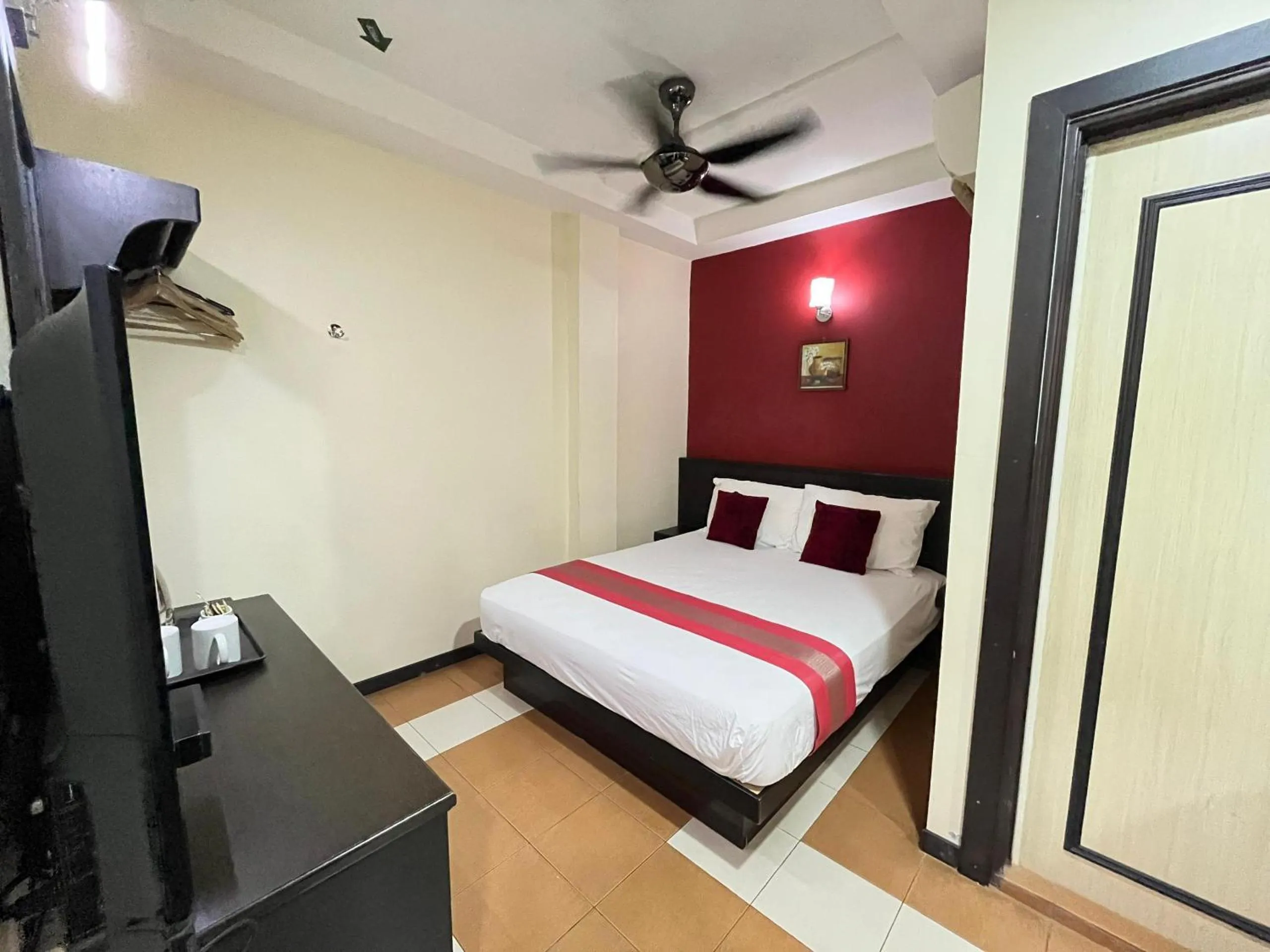 Bed in Sera Sentosa Inn