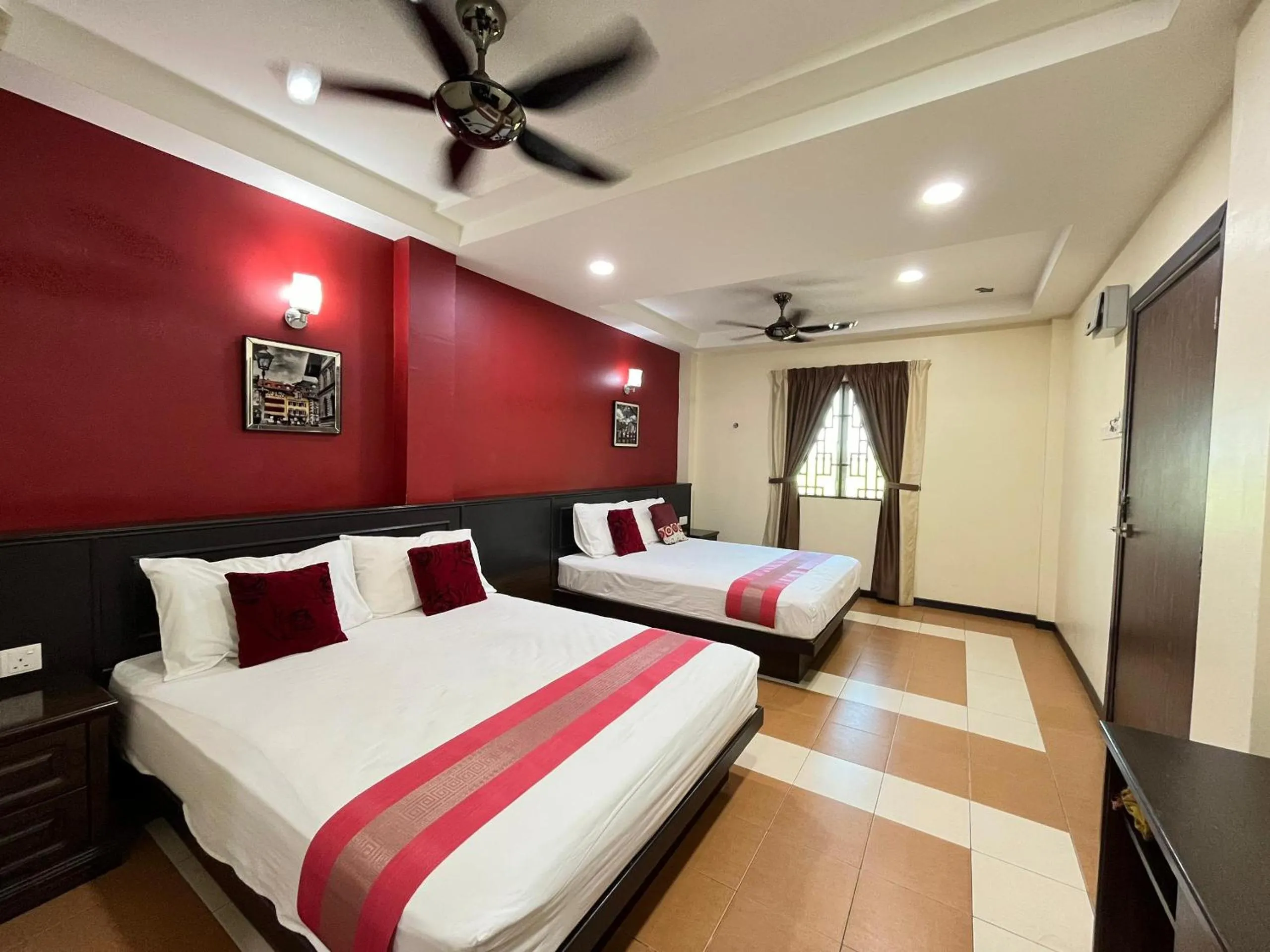 Bed in Sera Sentosa Inn