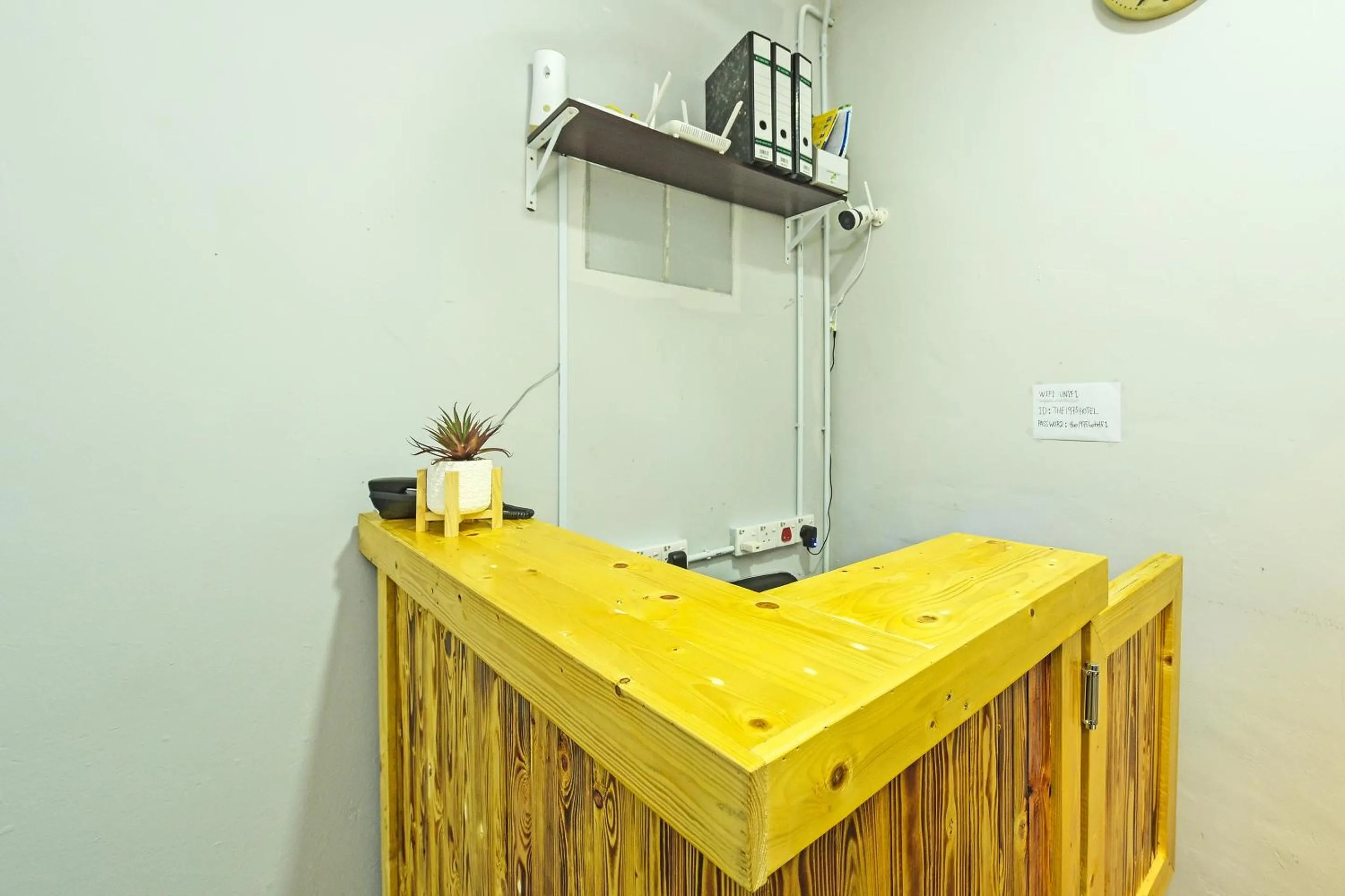 Lobby or reception in OYO 90662 The 1975 Hotel Empire