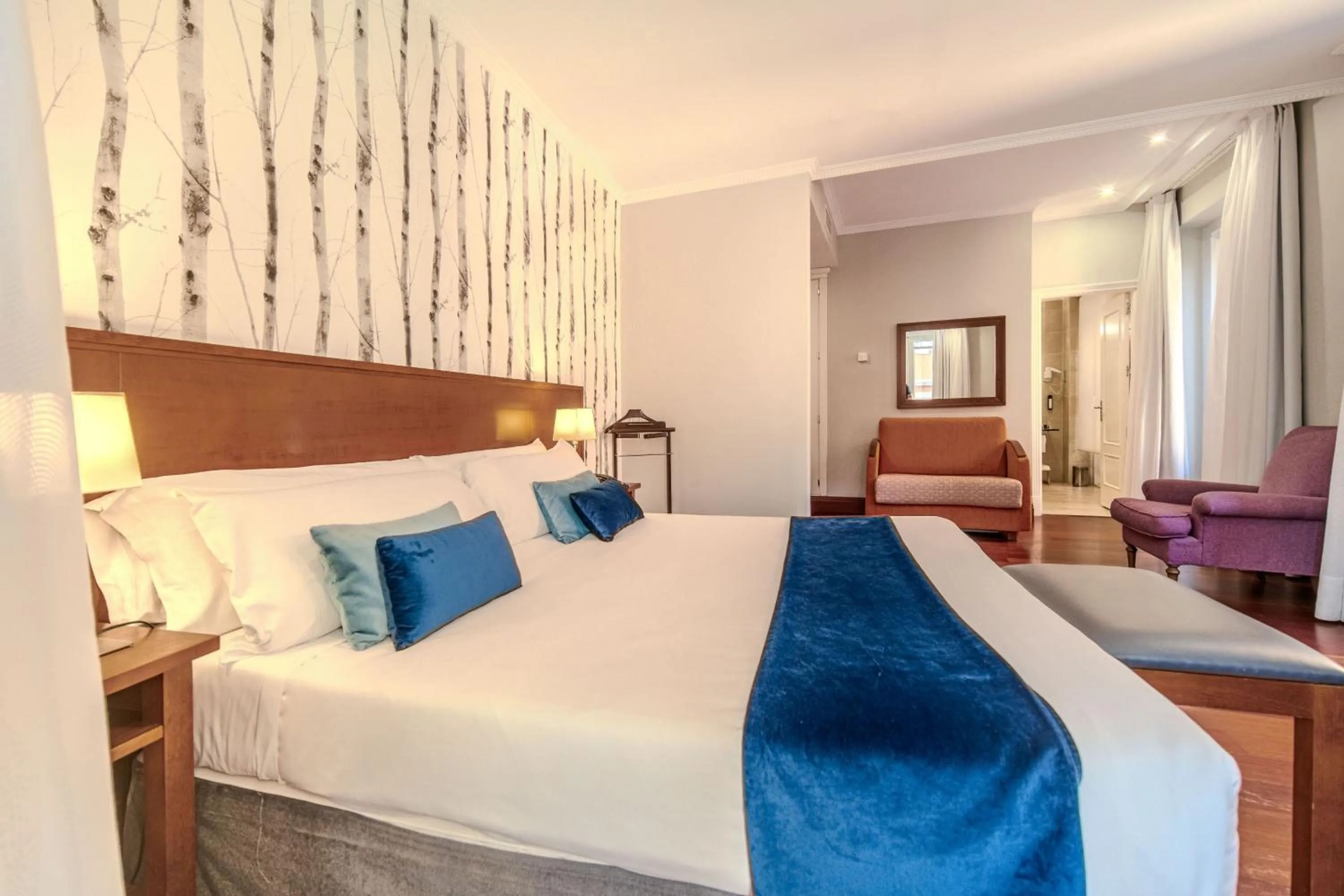 Photo of the whole room, Bed in ITC Infantas by Soho Boutique