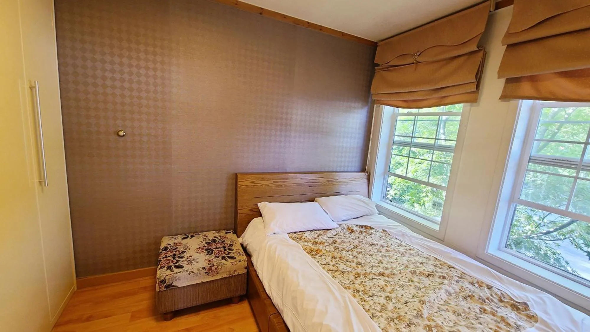 Bed in Elf Resort Hotel