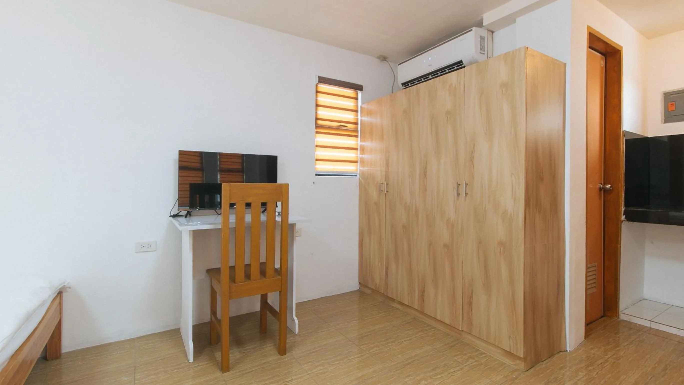 TV and multimedia in RedDoorz @ Alquiza Residences Paranaque