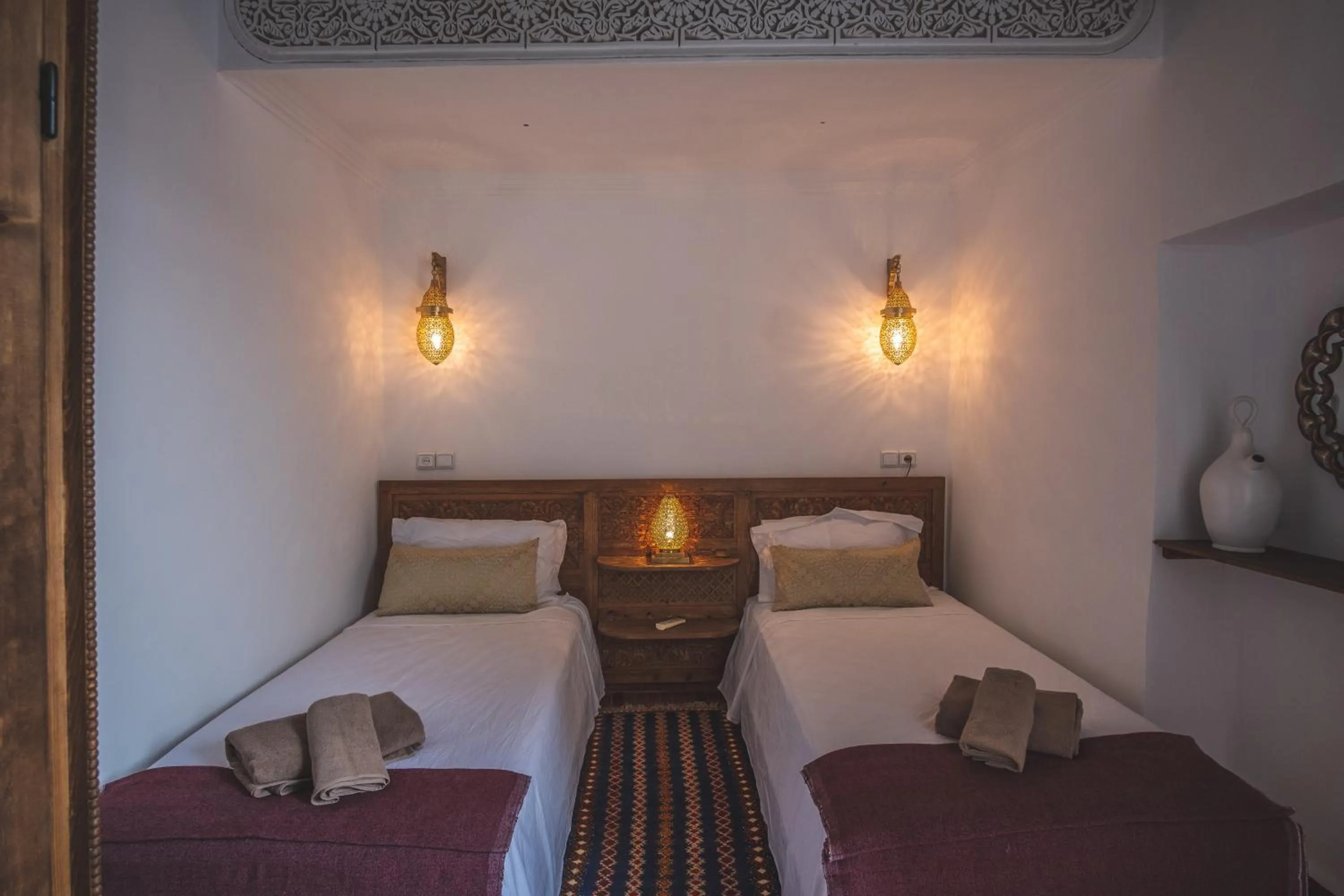 Bed in Riad Villa Berna under Swiss Management
