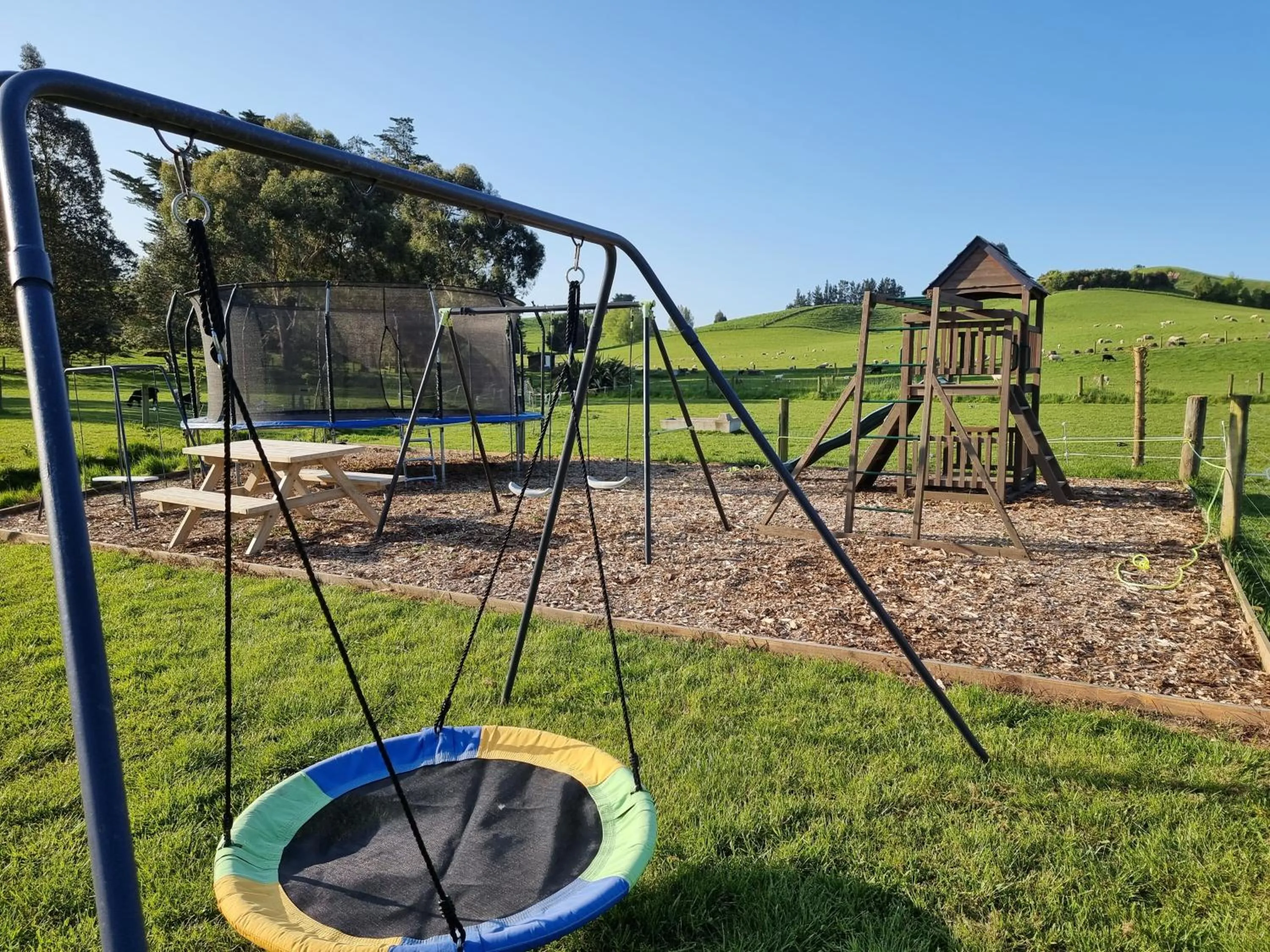 Children play ground in Cheviot Motels, Cabins and Camp