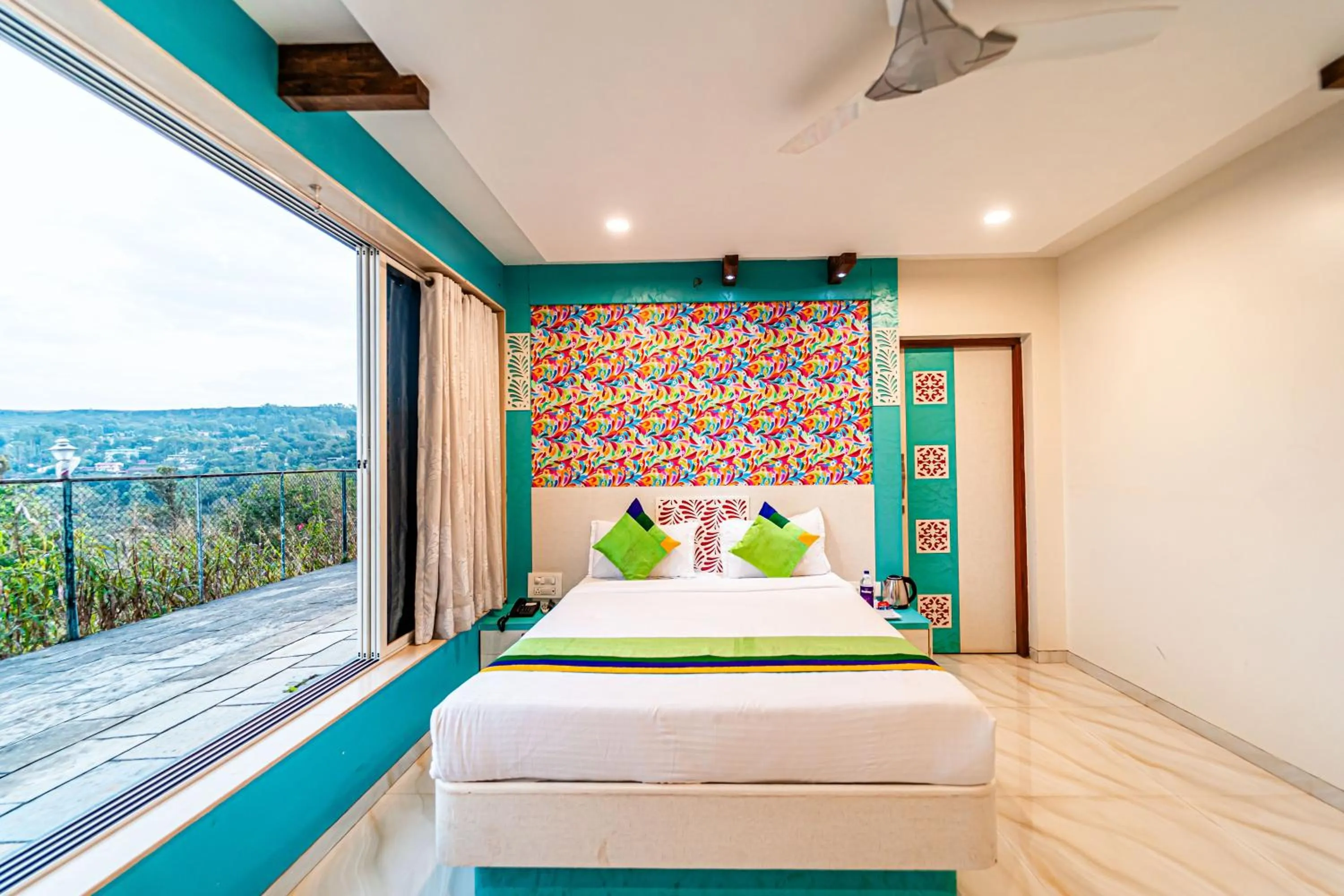 Bedroom in Treebo Raval Resort with Valley View