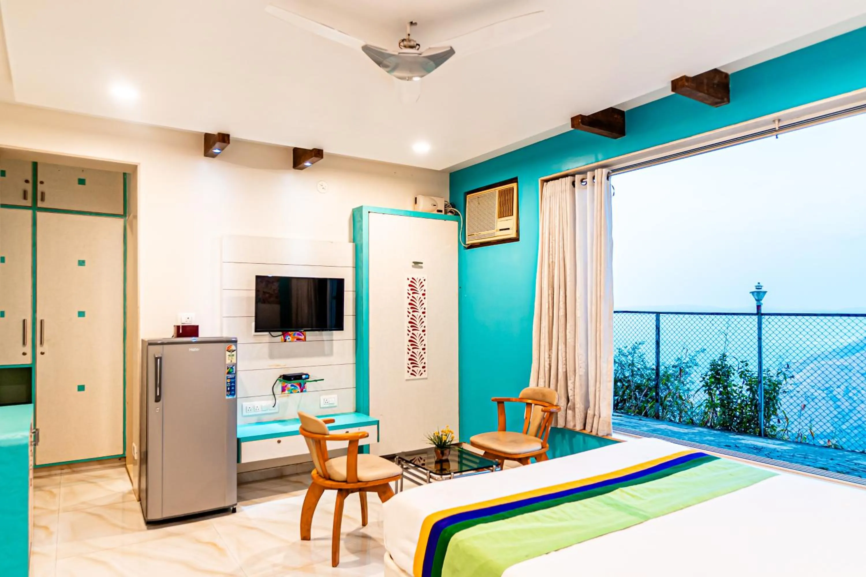 Bedroom in Treebo Raval Resort with Valley View