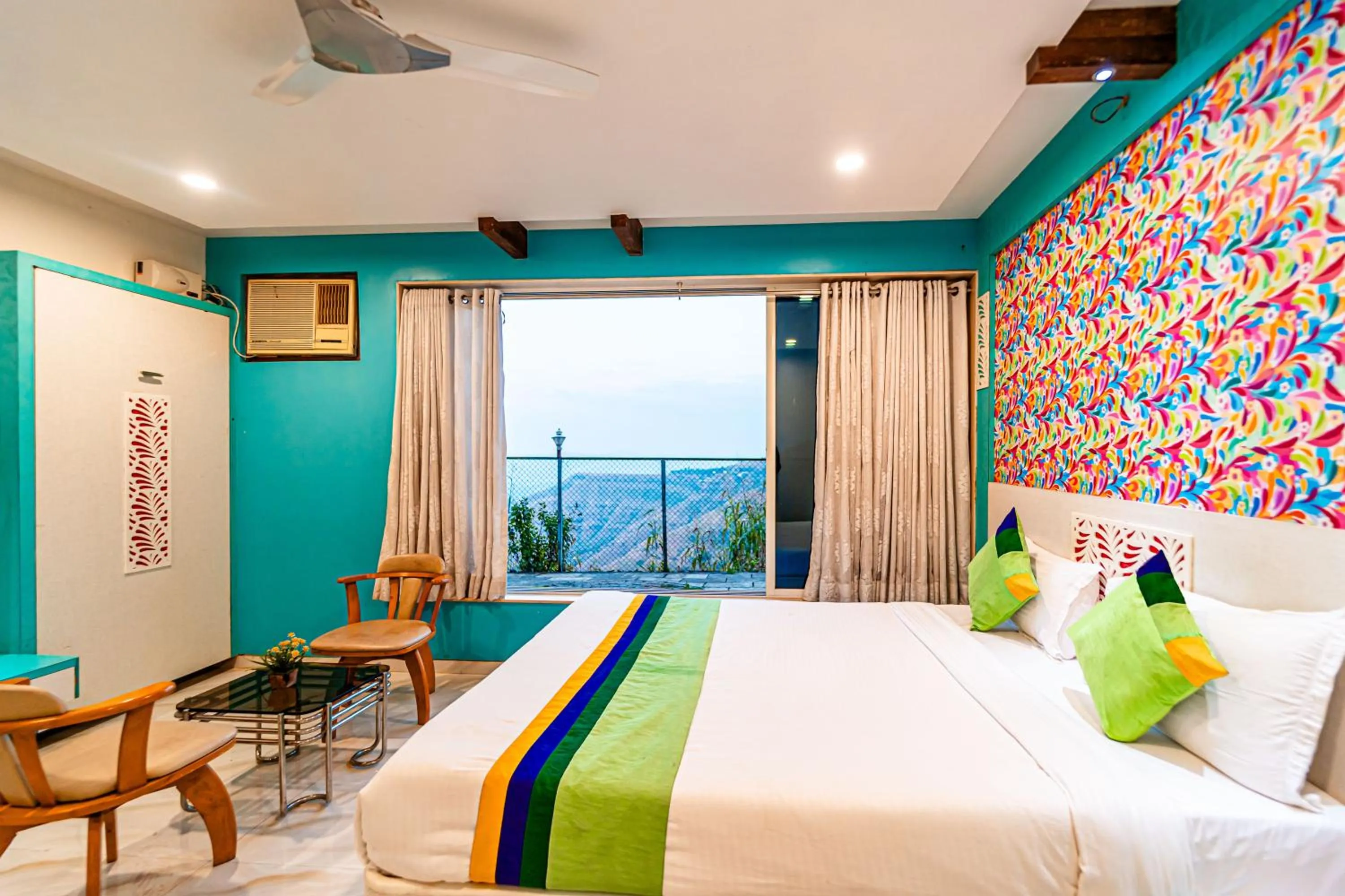 Bedroom in Treebo Raval Resort with Valley View