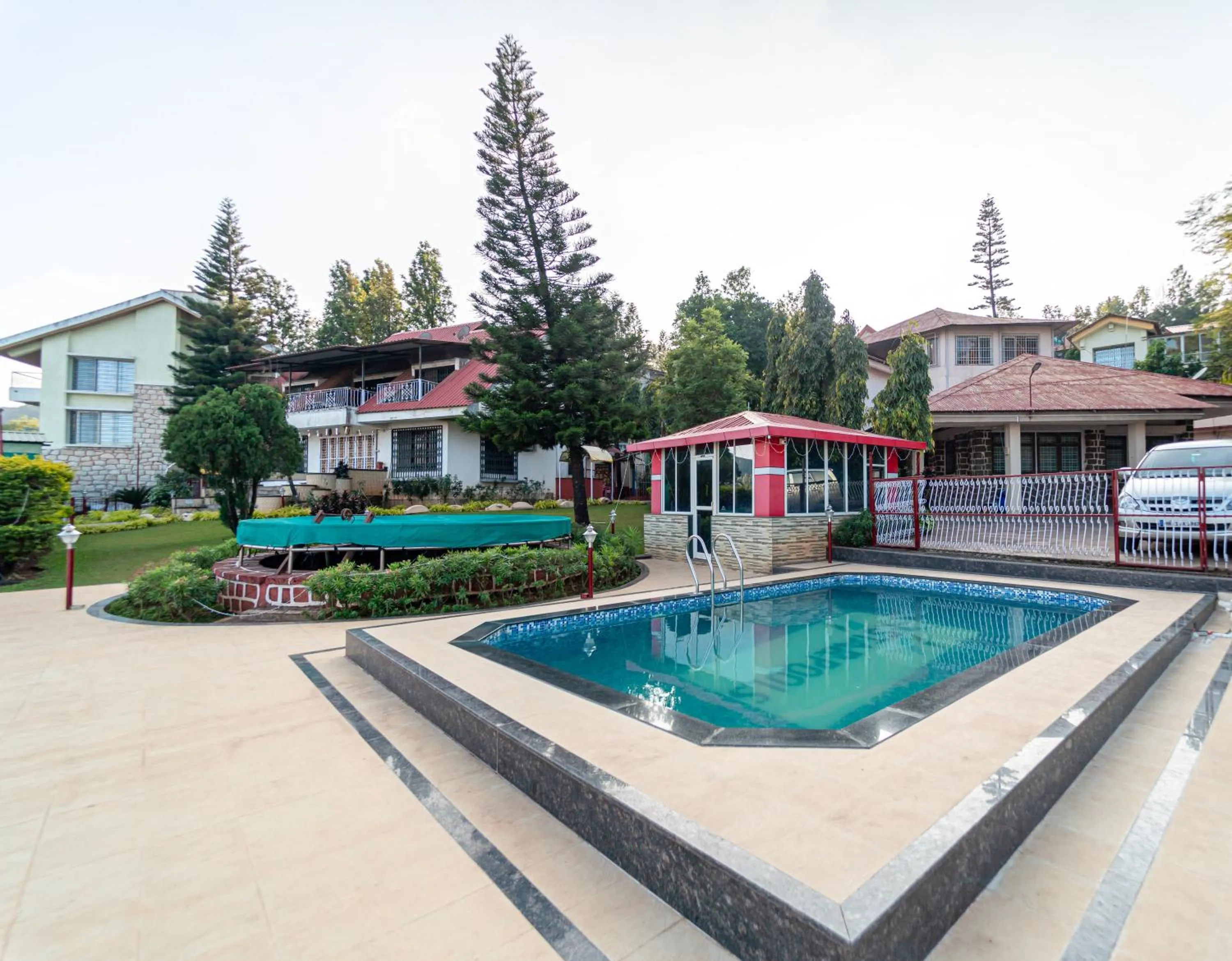 Swimming pool in Treebo Raval Resort with Valley View