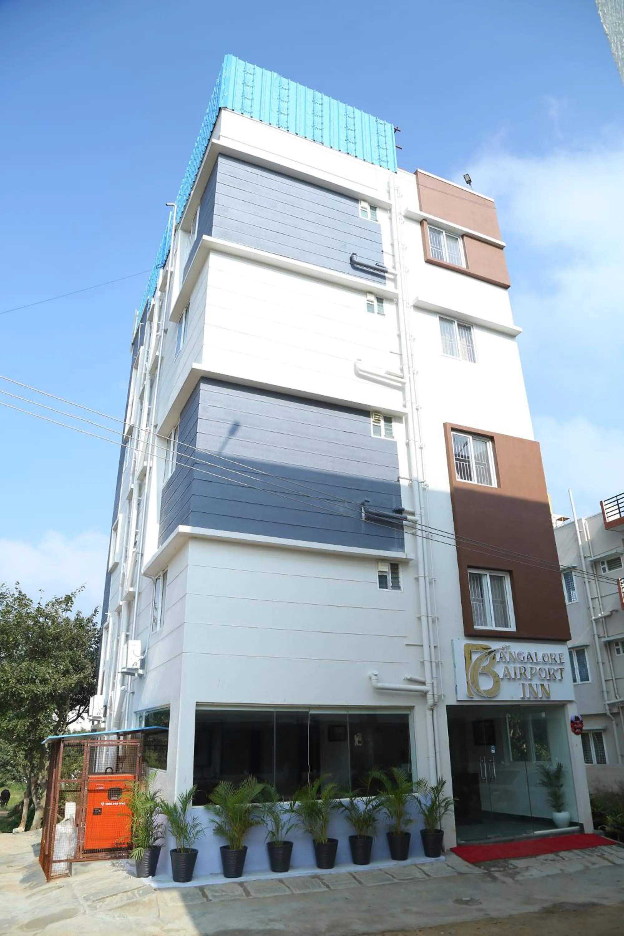 Property building in Hotel Bangalore Airport Inn, Near kempegowda Airport, Airport Pickup & Drop Available 24X7
