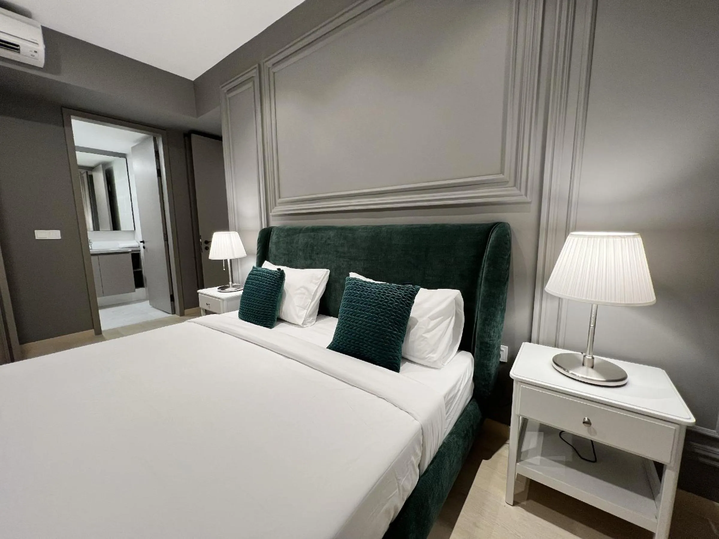 Bed in The Eaton Residences by Times 8