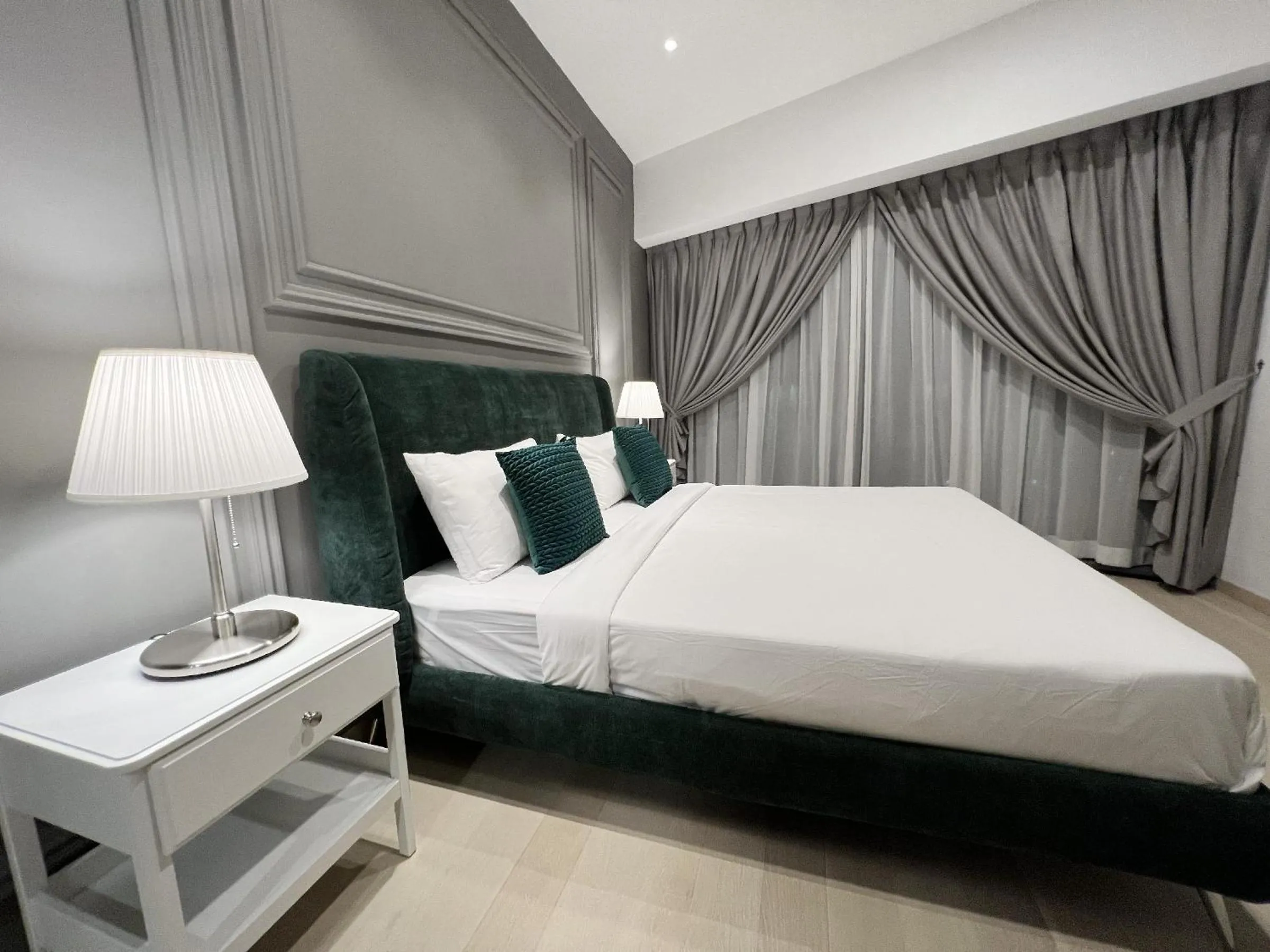 Bed in The Eaton Residences by Times 8