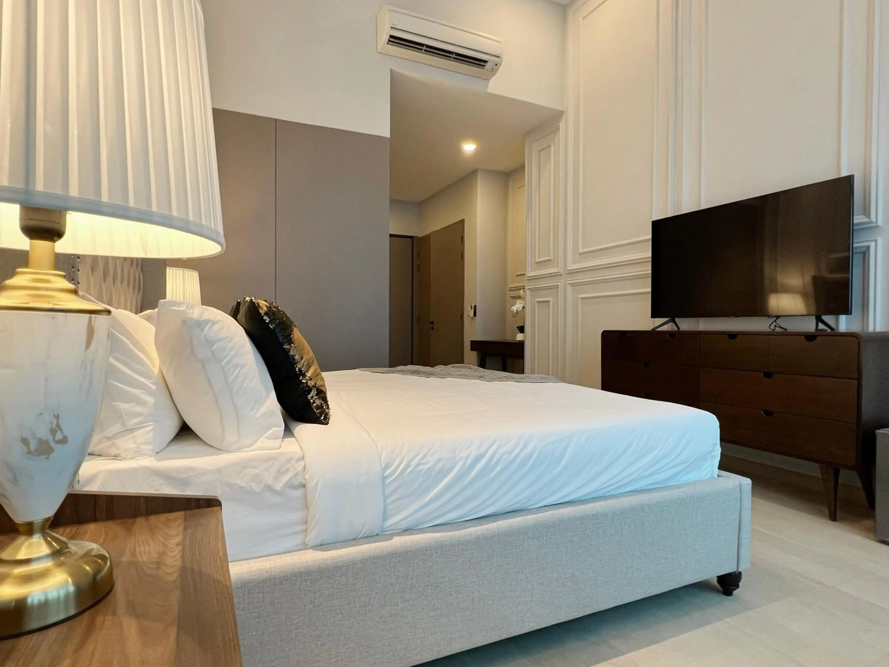 Bed in The Eaton Residences by Times 8