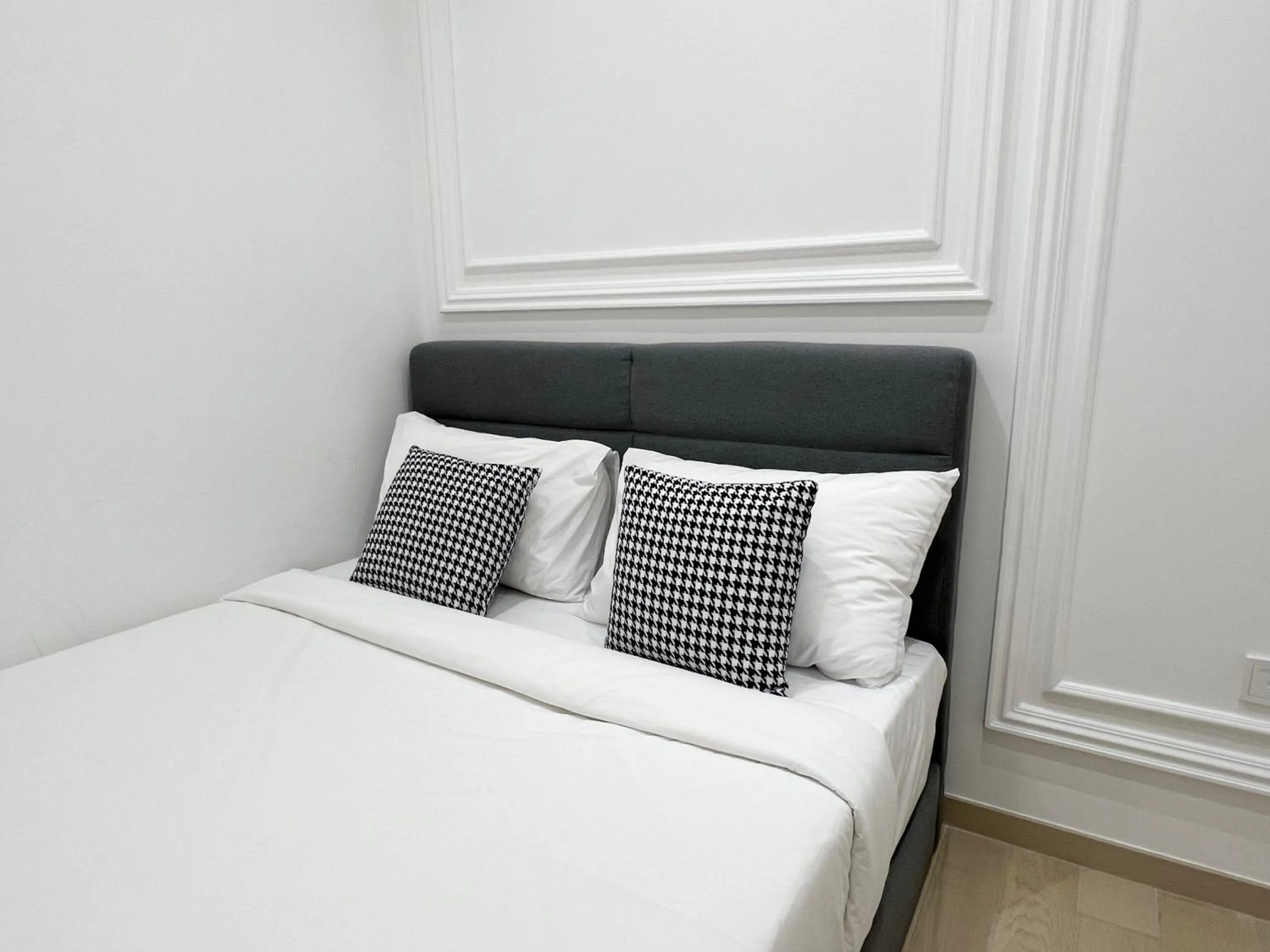 Bed in The Eaton Residences by Times 8