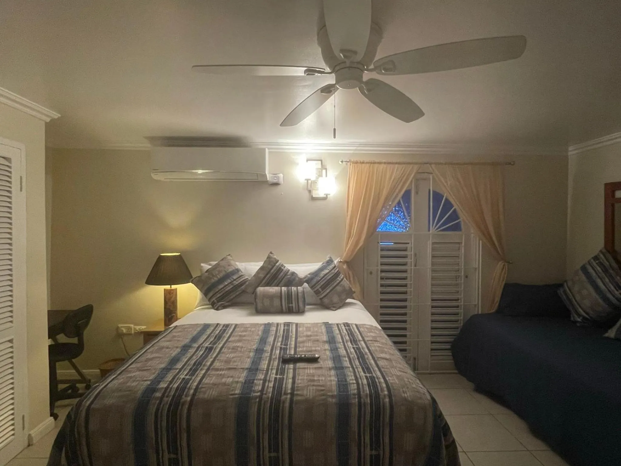 Bed in Hummingbird Retreat - Luxury Oceanview Apt, 7-Minute Walk to Beach
