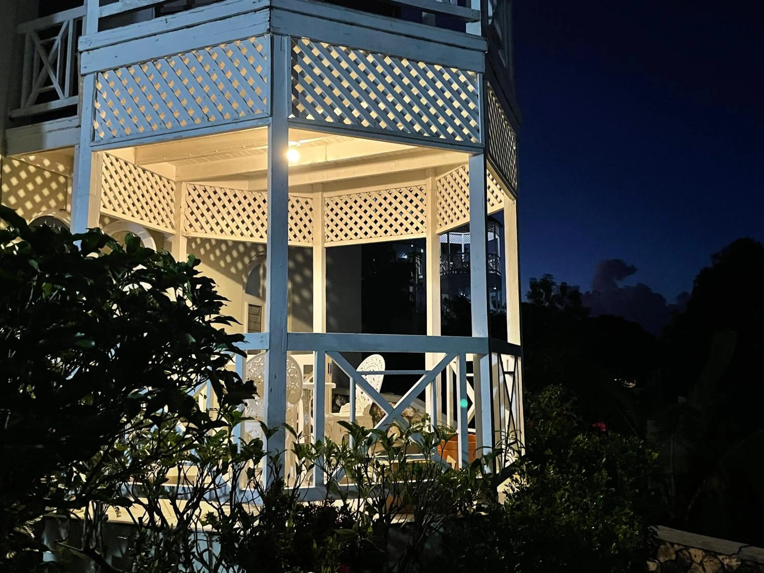 Patio in Hummingbird Retreat - Luxury Oceanview Apt, 7-Minute Walk to Beach