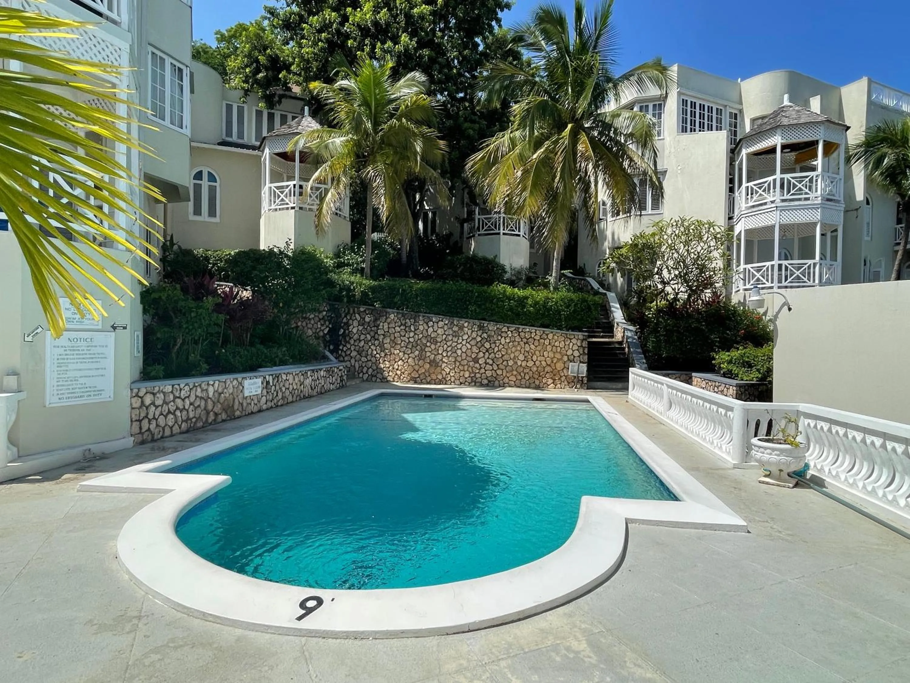 Day in Hummingbird Retreat - Luxury Oceanview Apt, 7-Minute Walk to Beach