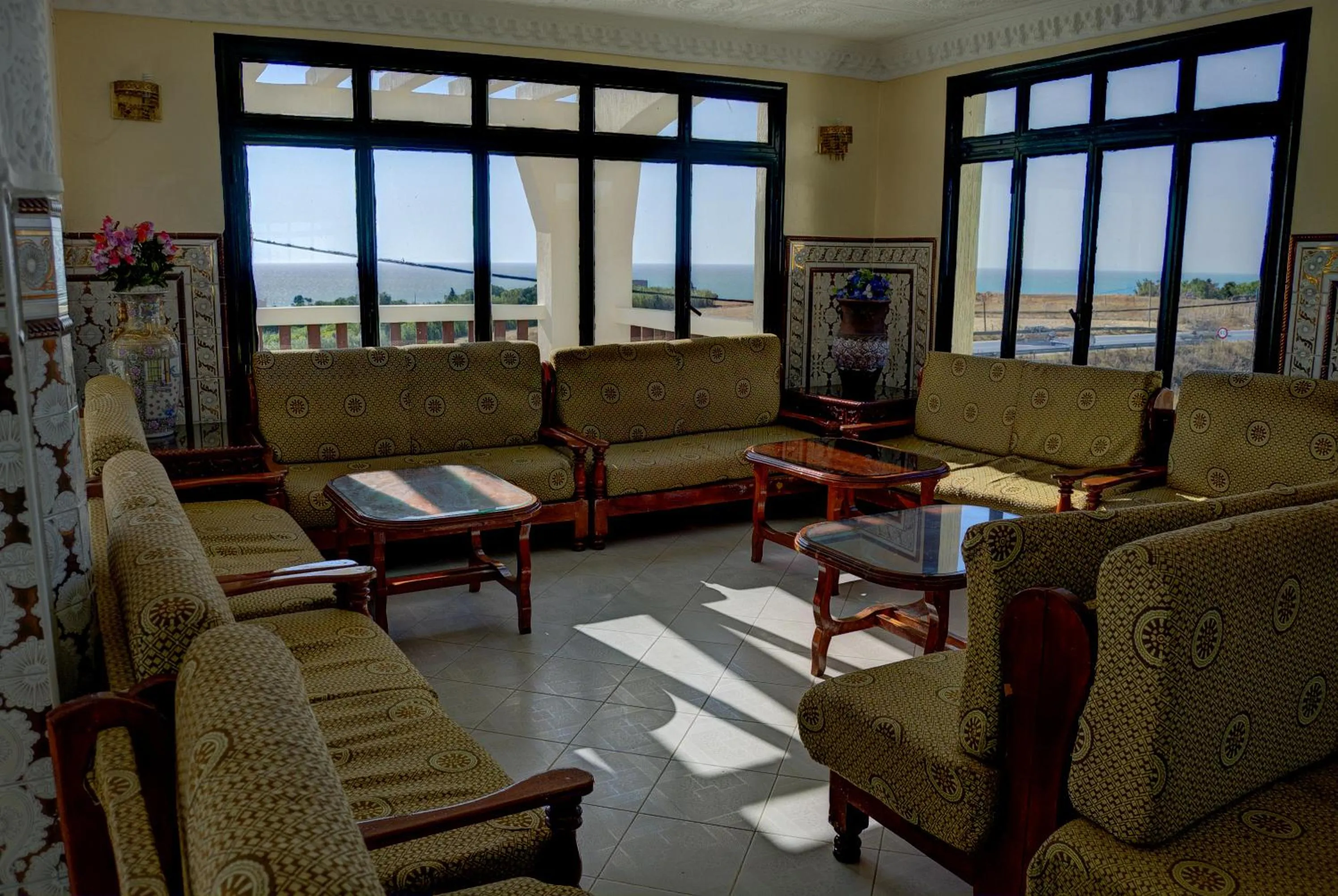 Communal lounge/ TV room in Hôtel Briech & Spa