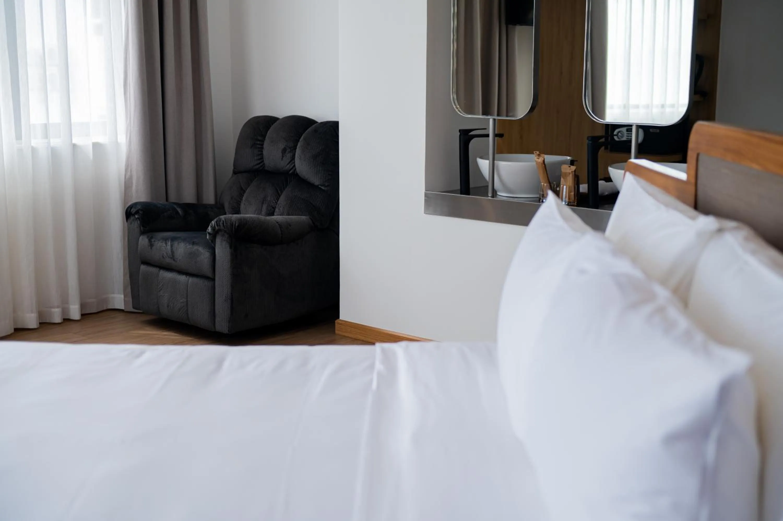 Bed in PĀMA Boutique Hotel & Bistro