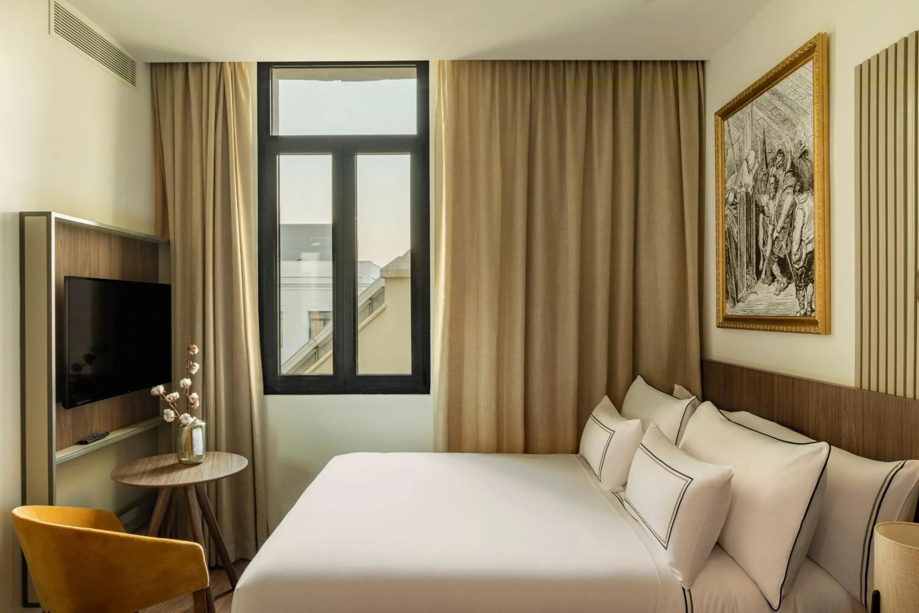 Communal lounge/ TV room, Bed in Casa de las Artes, member of Meliá Collection