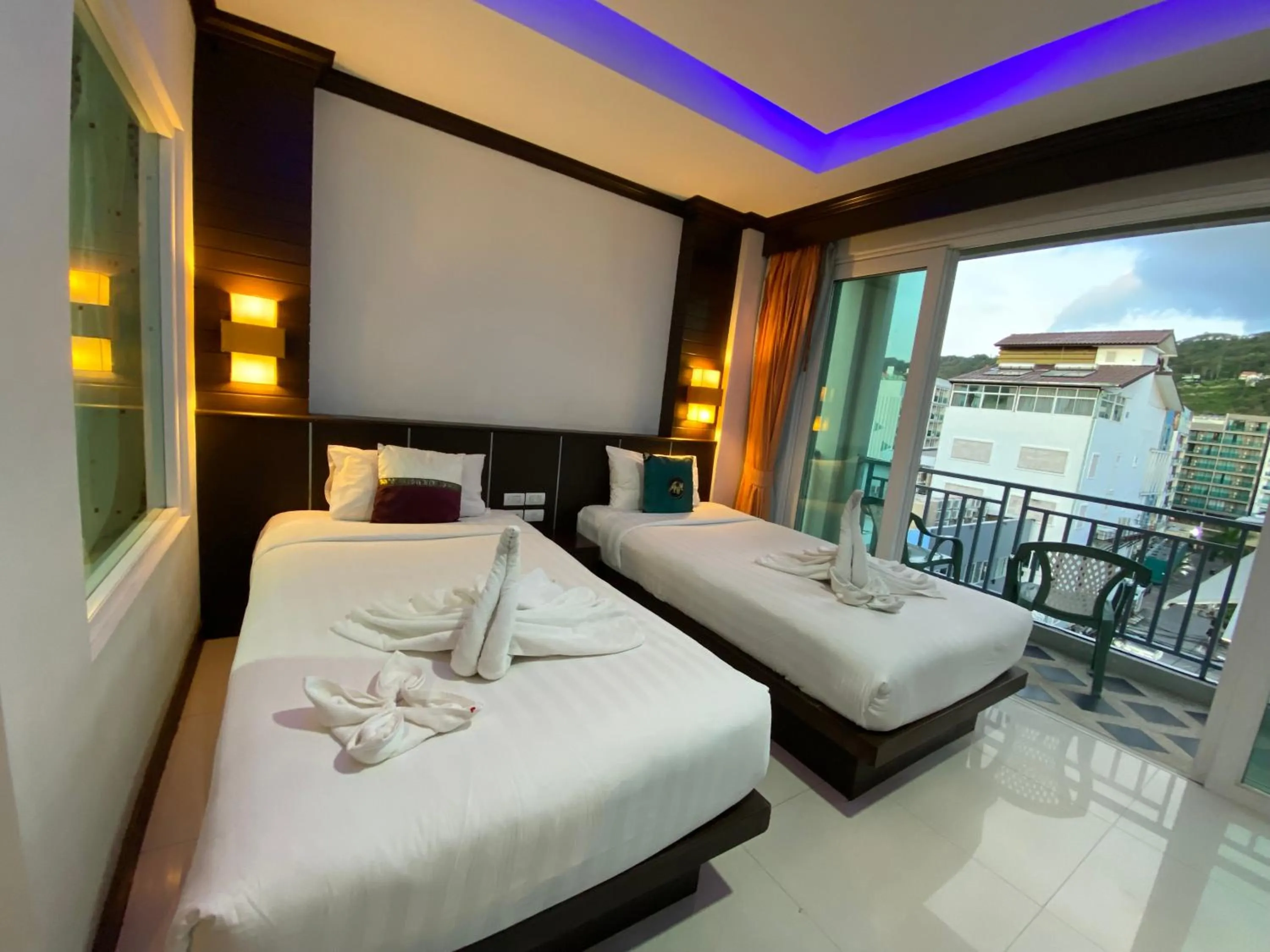 Bed in 77 Patong Hotel & Spa