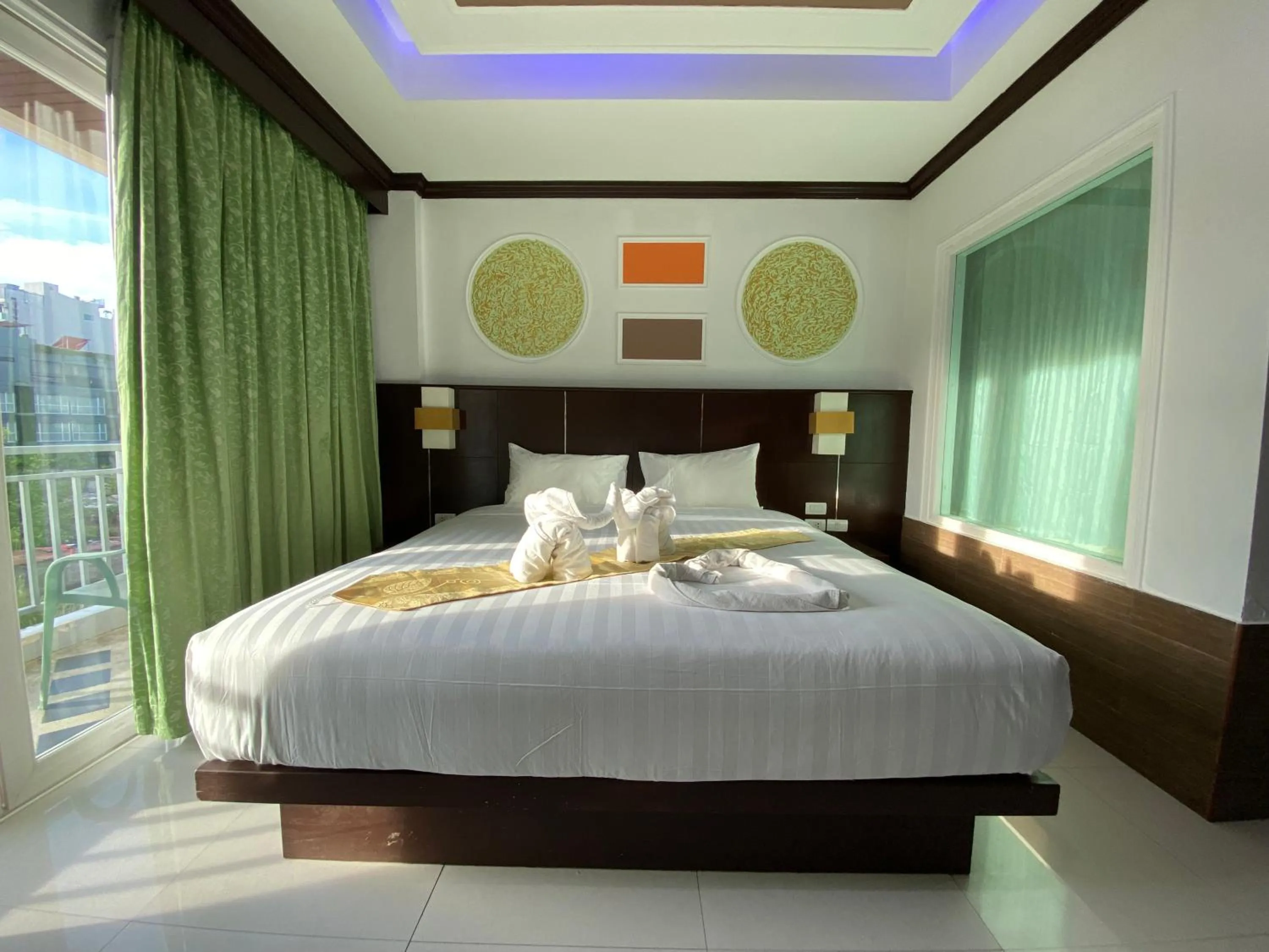 Bed in 77 Patong Hotel & Spa