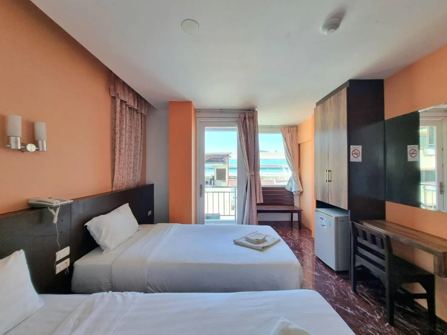 Bed in 77 Patong Hotel & Spa