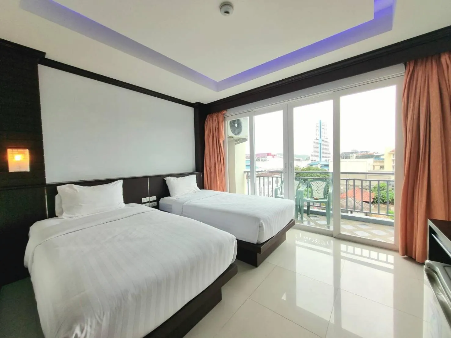 Bed in 77 Patong Hotel & Spa