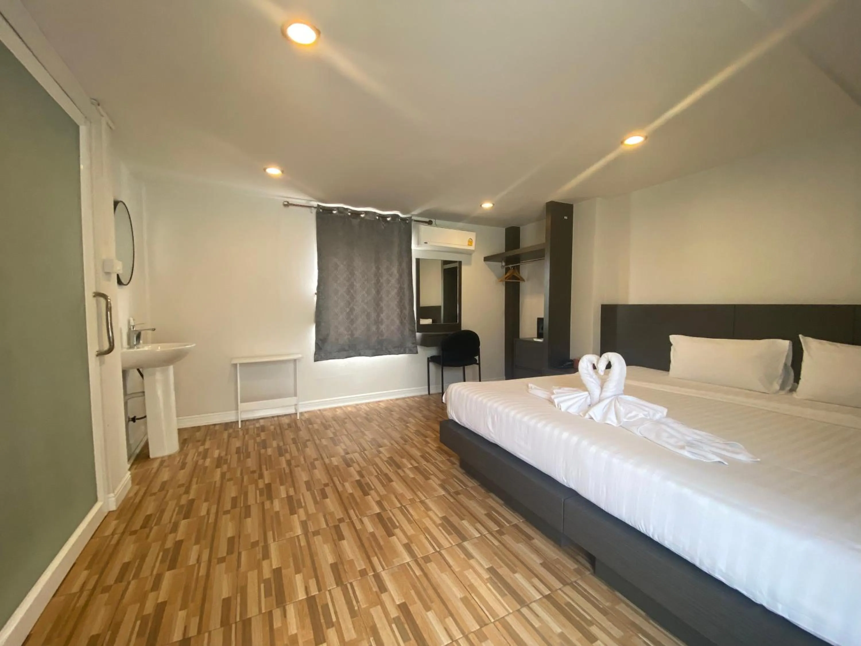 Bed in 77 Patong Hotel & Spa