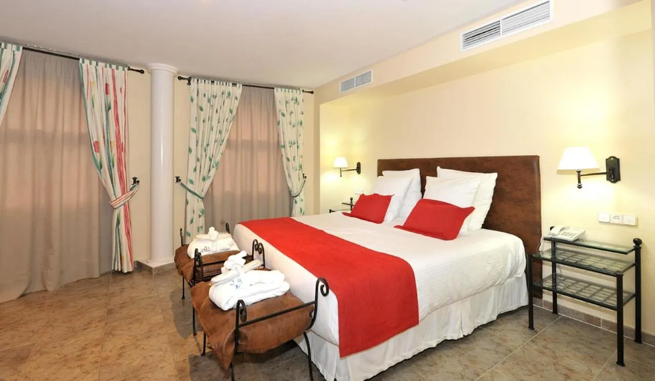 Bed in Hotel Salobreña Suites