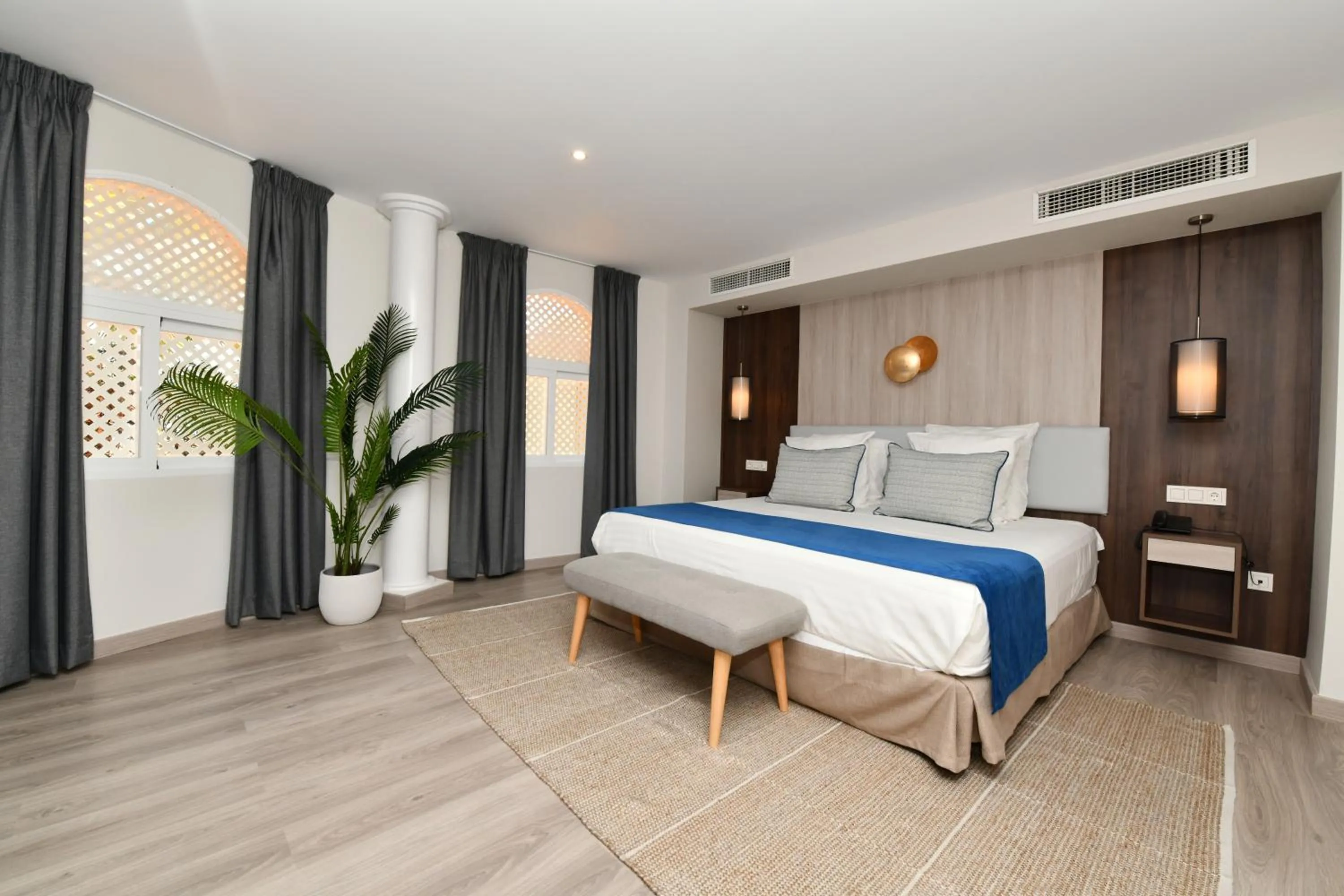 Bed in Hotel Salobreña Suites