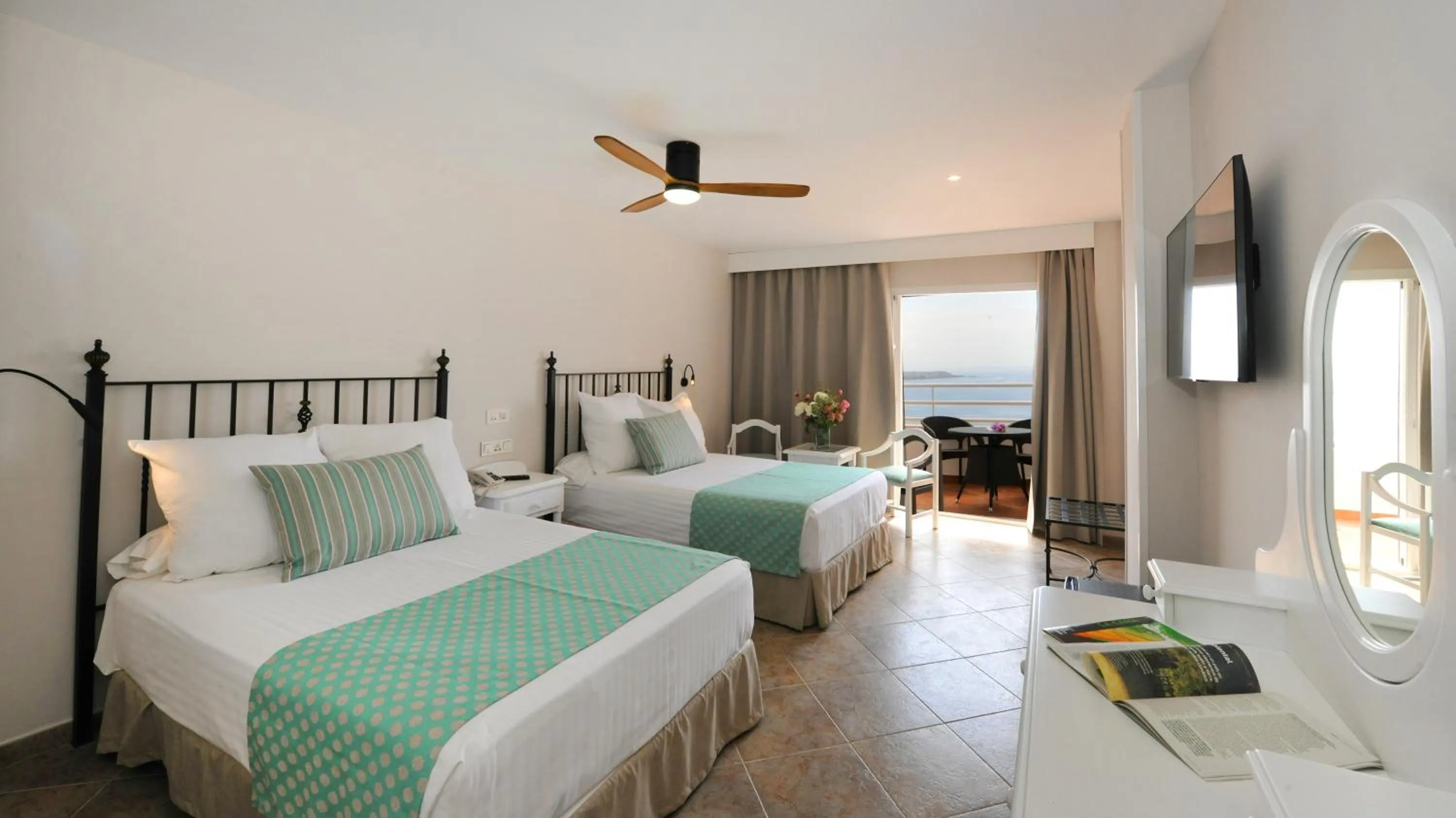 Bed in Hotel Salobreña Suites