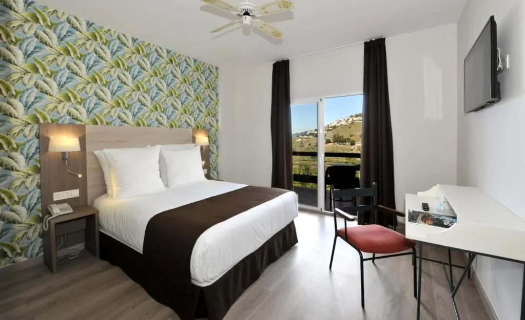 Bed in Hotel Salobreña Suites