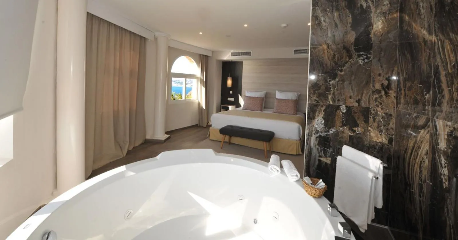 Bed in Hotel Salobreña Suites