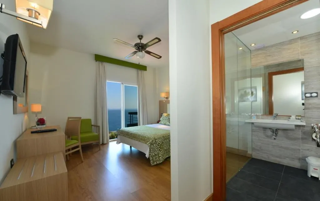 Photo of the whole room, Bed in Hotel Salobreña Suites