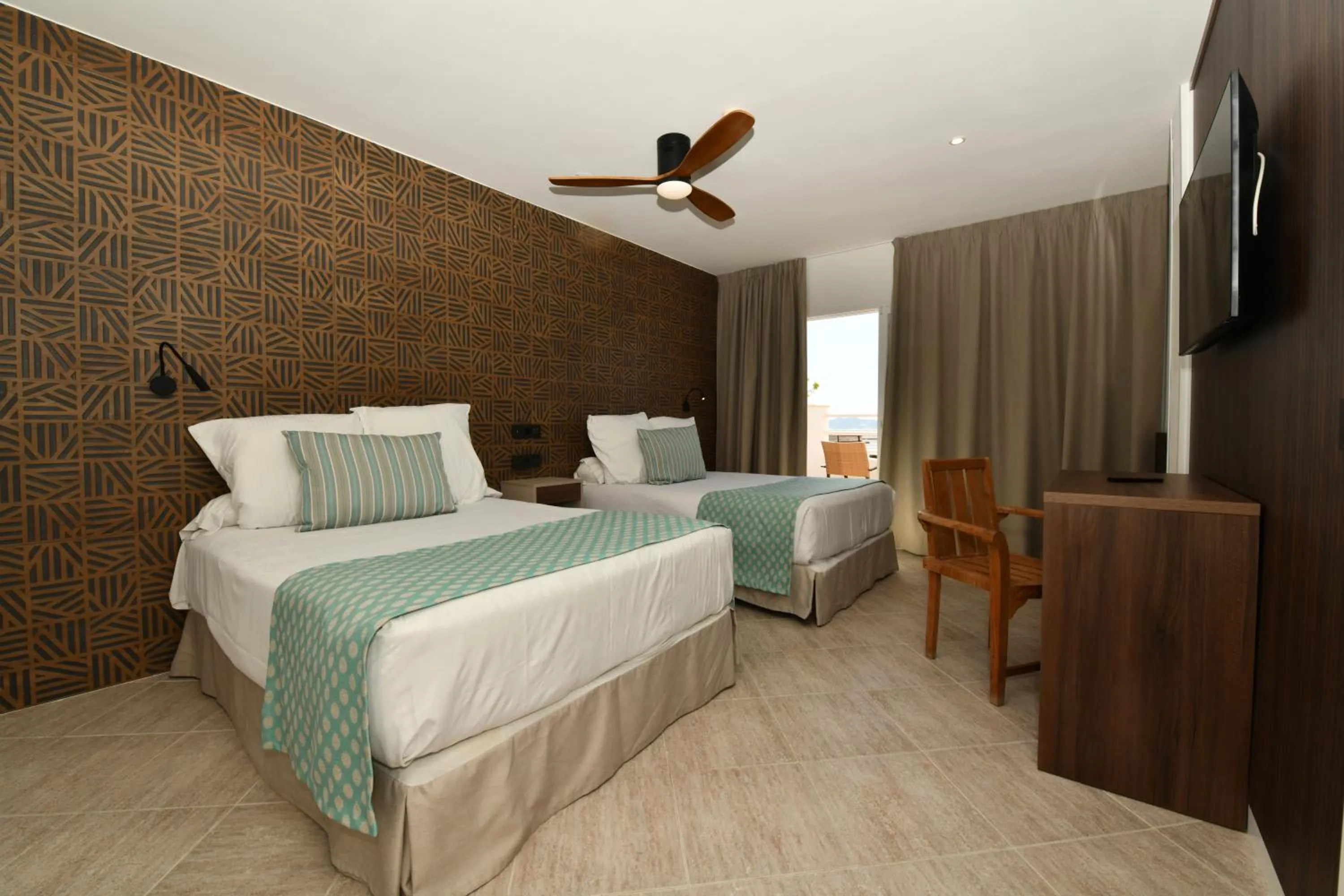 Bed in Hotel Salobreña Suites