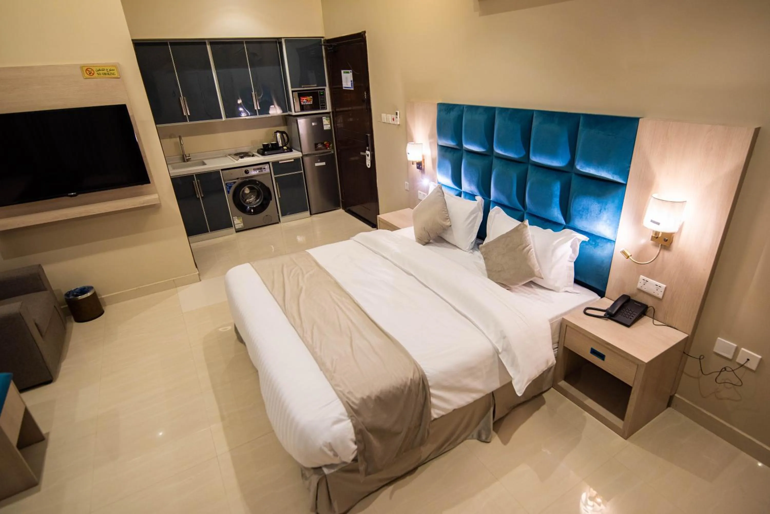 Bed in Granada Palace Inn