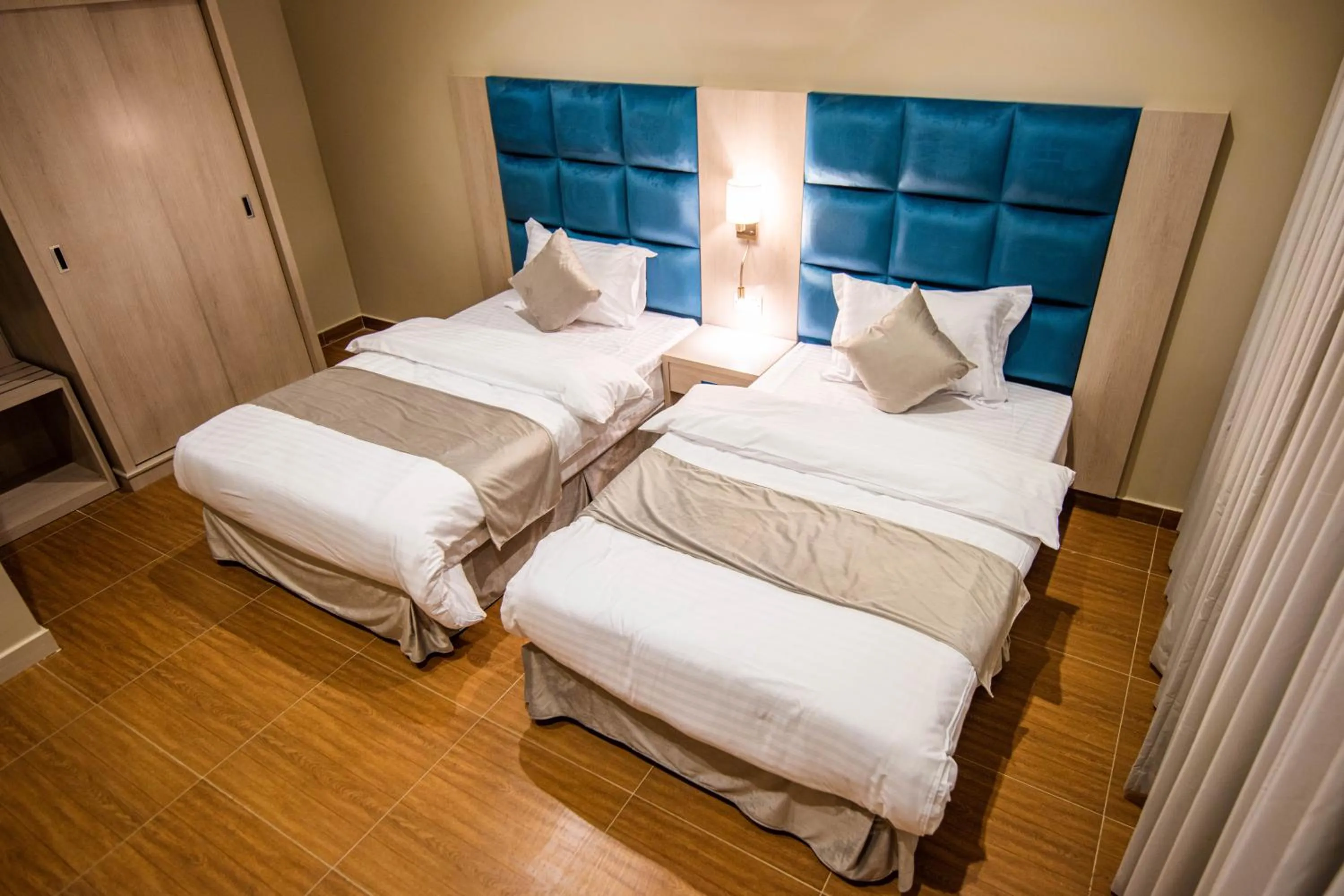 Bed in Granada Palace Inn