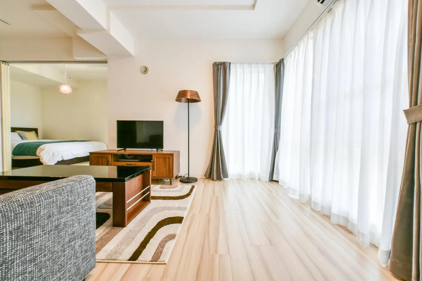 Living room, Bed in GLASS Yamahana EAST