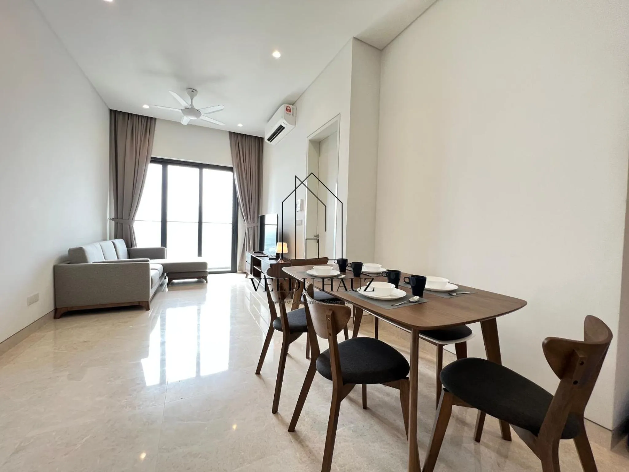 Living room in Lucentia Residences BBCC at Lalaport Kuala Lumpur by Veedu Hauz