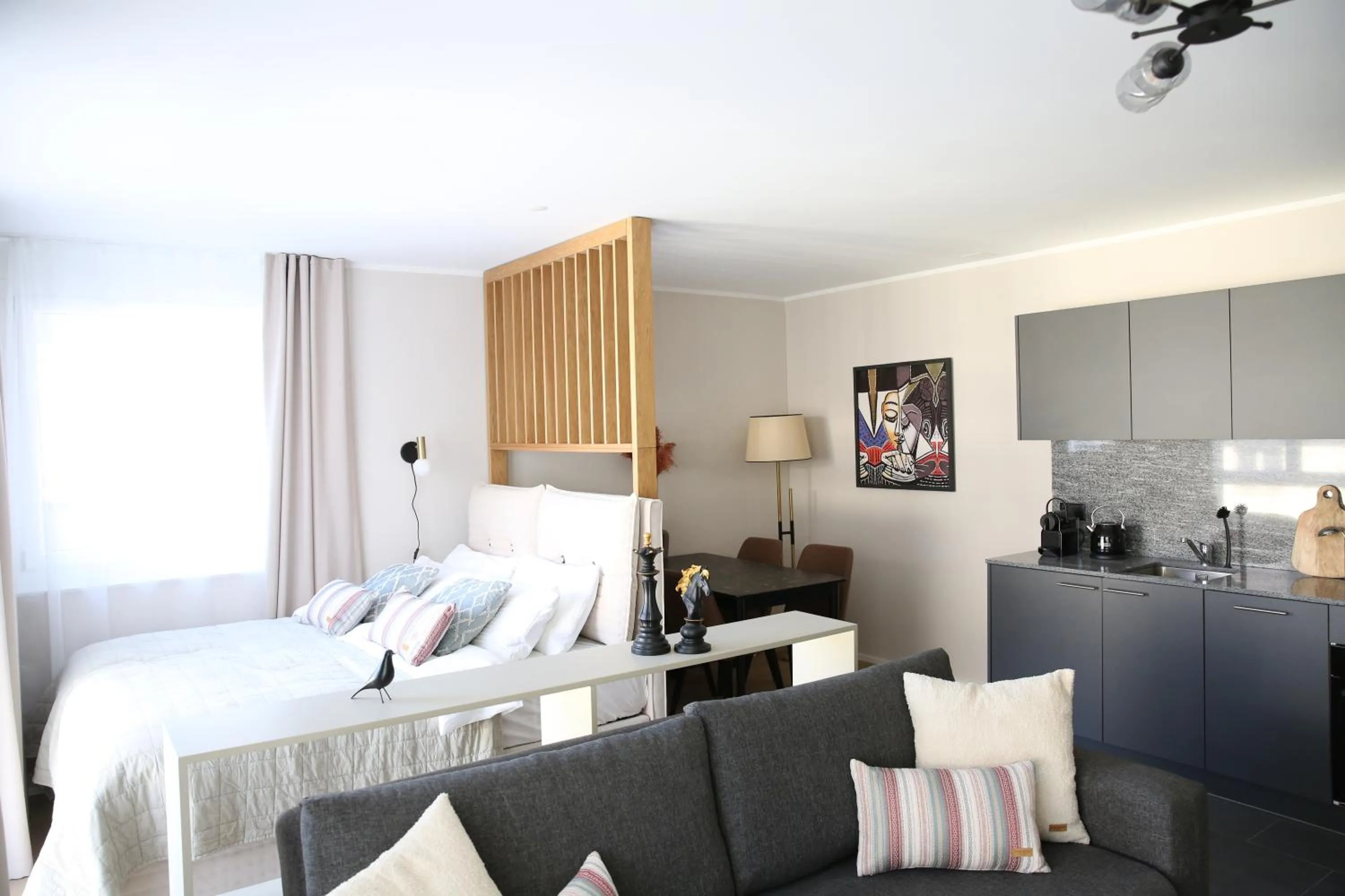 Living room, Bed in Lamira Serviced Apartments Zurich City