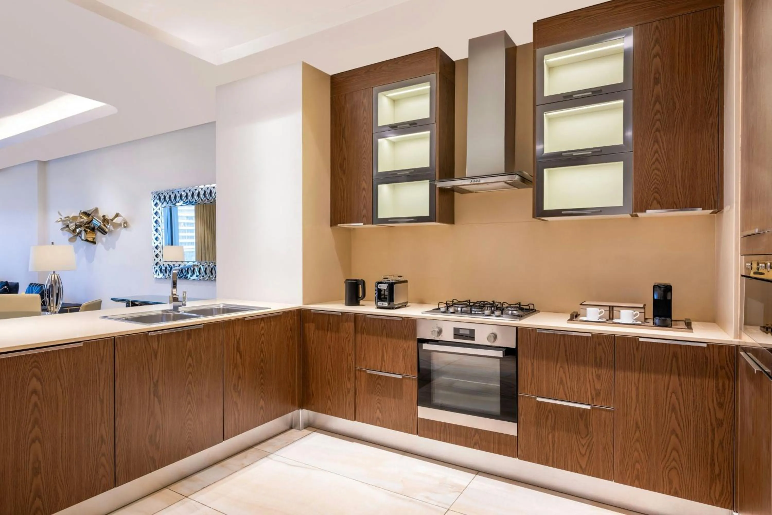 Kitchen or kitchenette in Agora, Doha, Autograph Collection