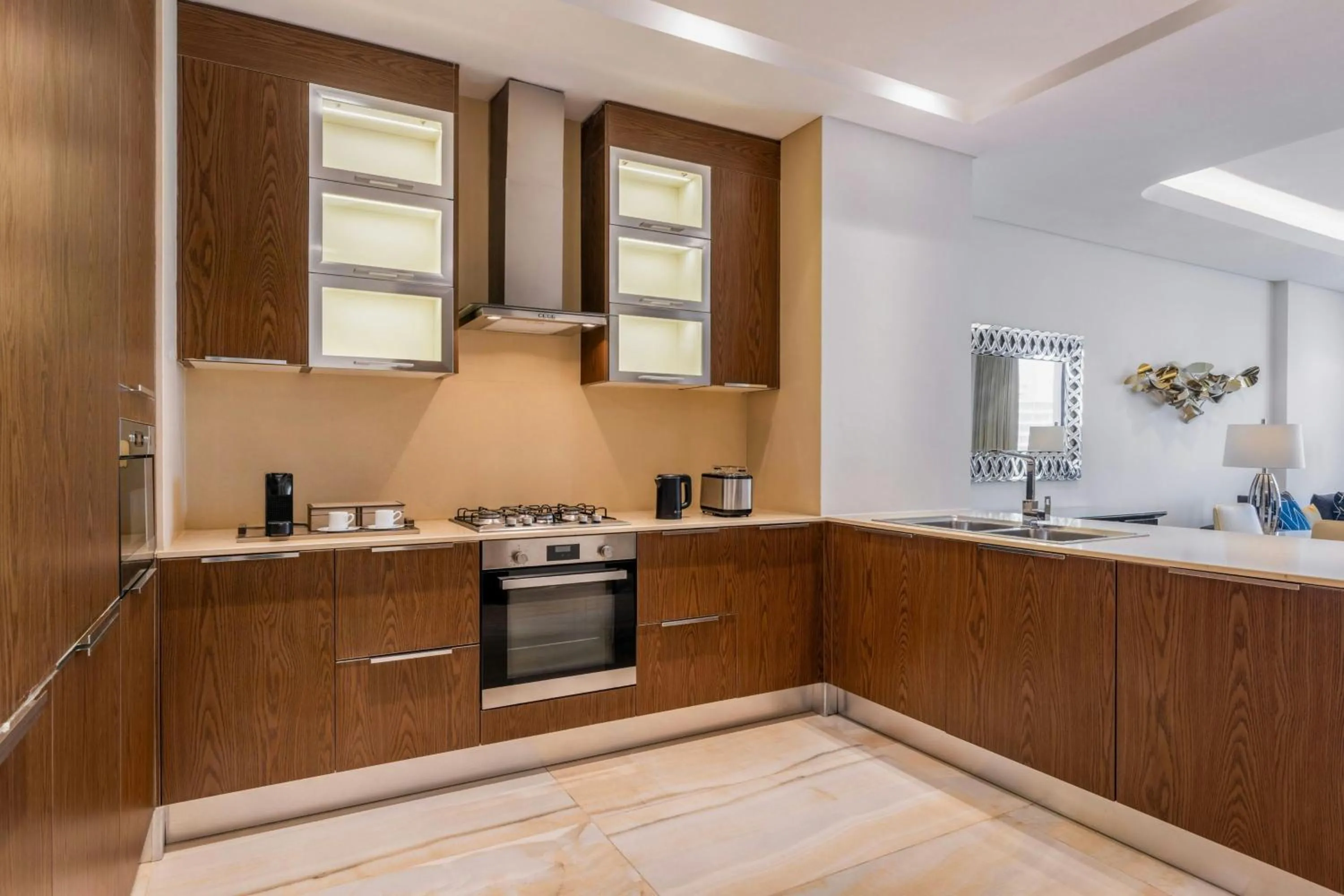 Kitchen or kitchenette in Agora, Doha, Autograph Collection