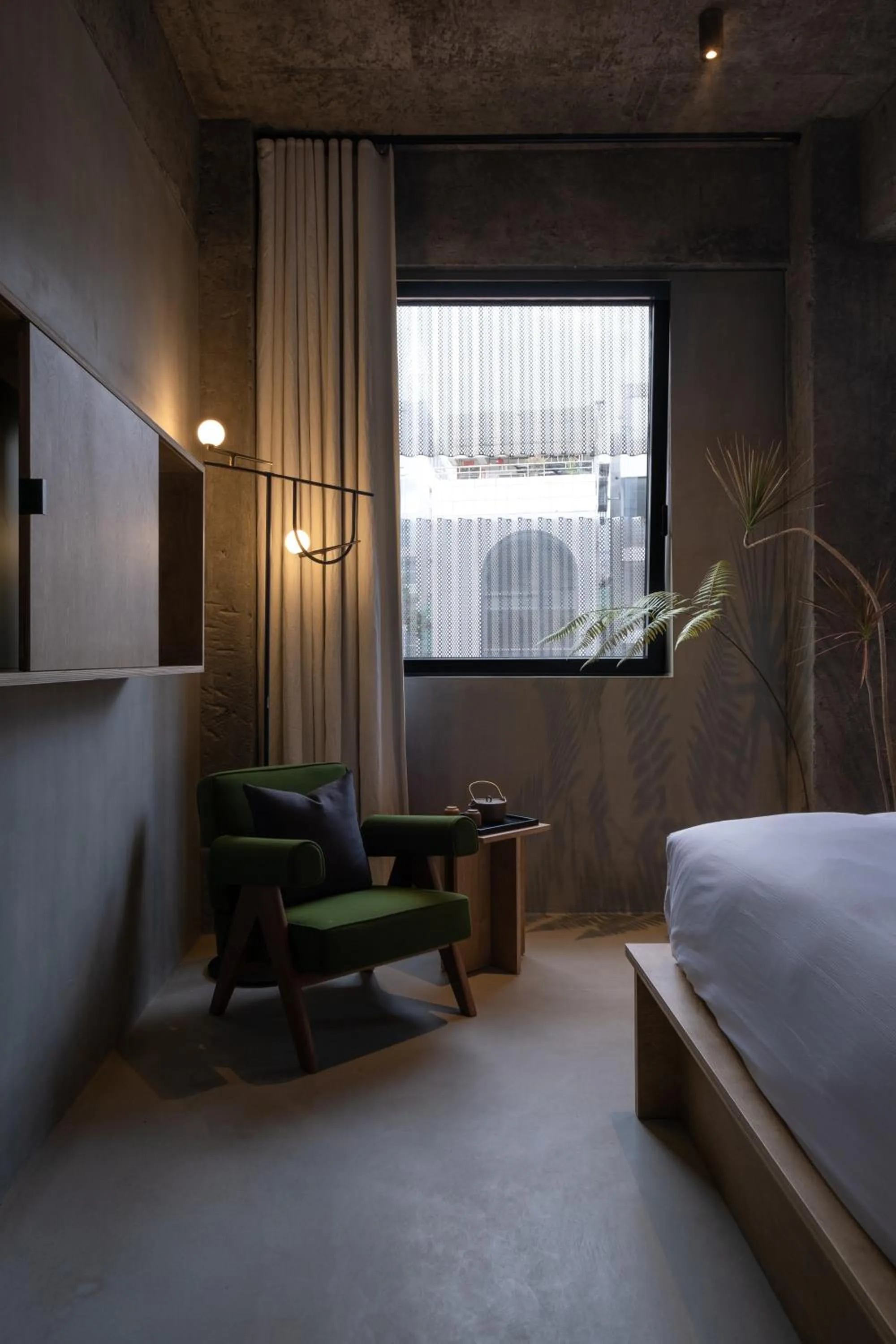 Seating area, Bed in Jiangnan House Nantou