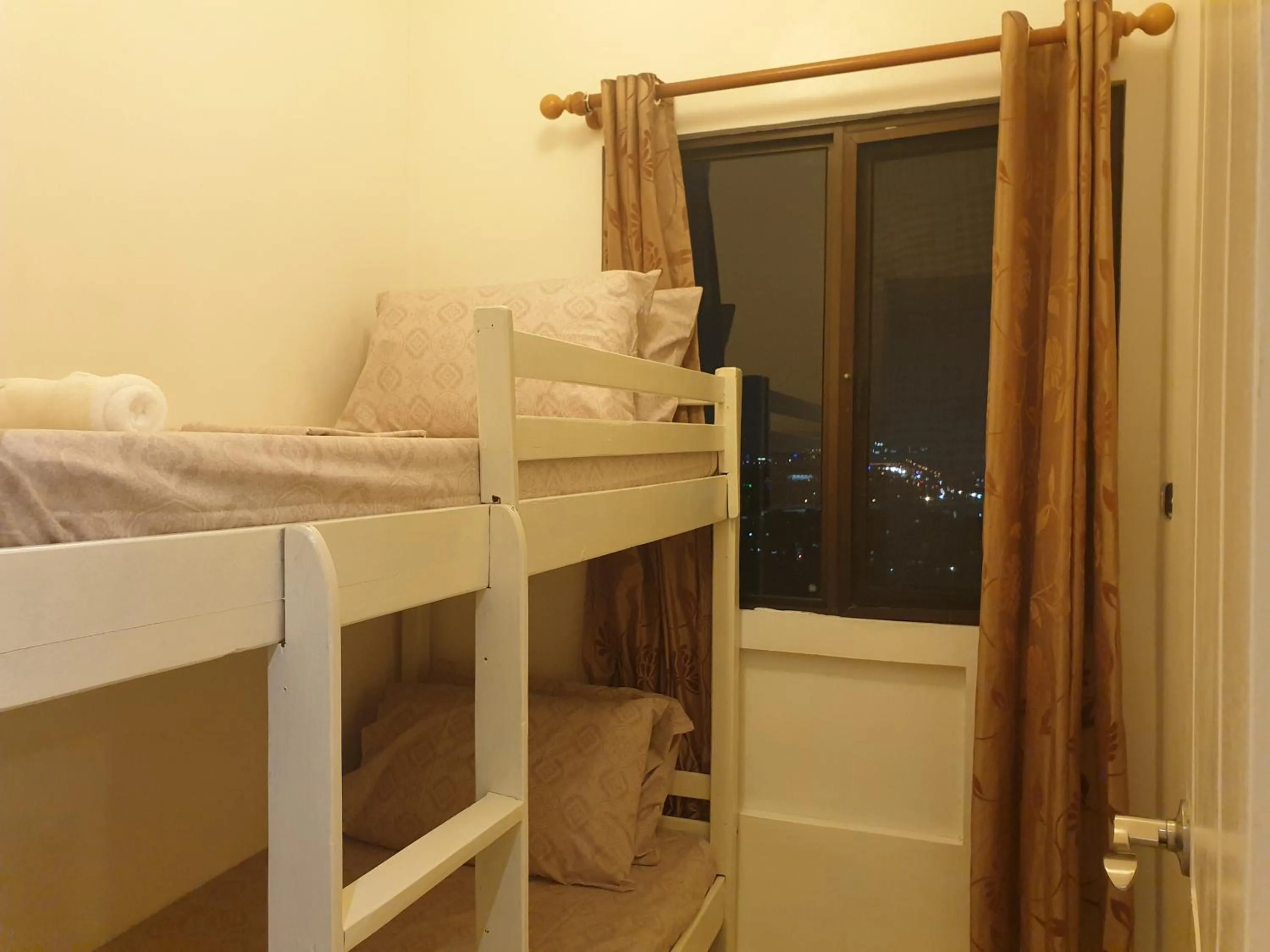 Bed in Spacious Penthouse Near NAIA with 24-7 Convenience