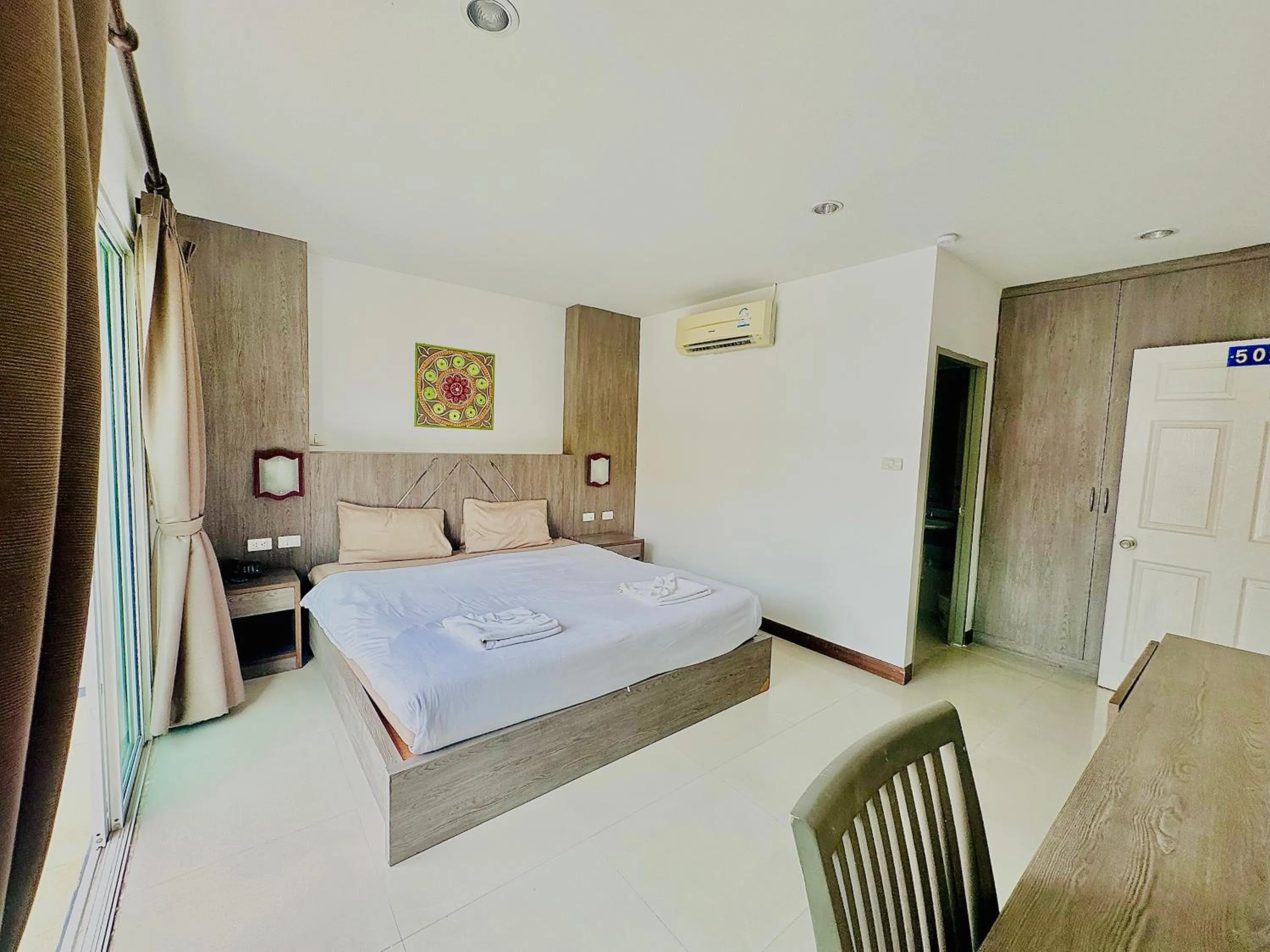 Bed in Cocoon Patong Hotel