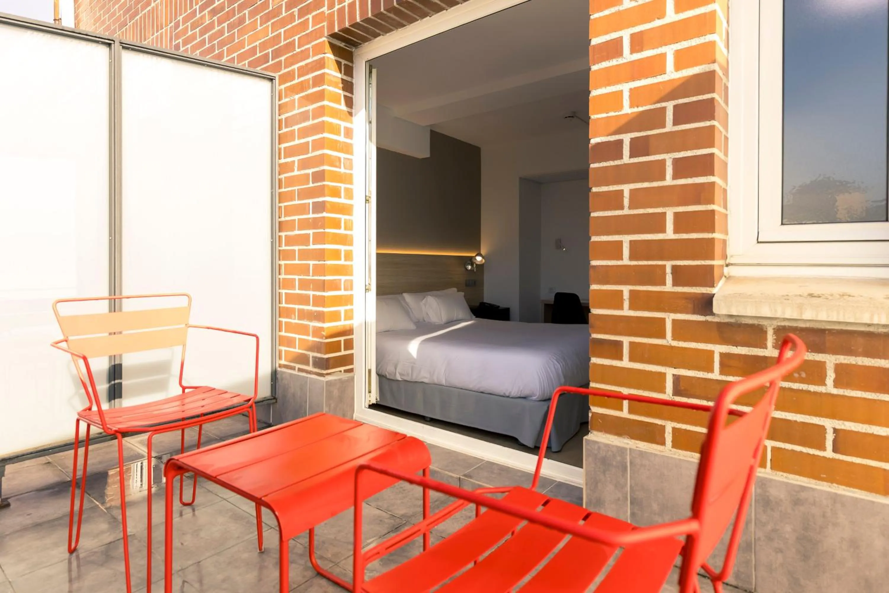 Balcony/Terrace, Bed in Hotel Burlada